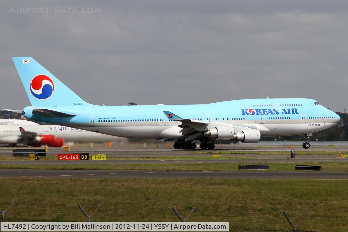 HL7492, Boeing 747-4B5 C/N 26397, taxiing from 34L