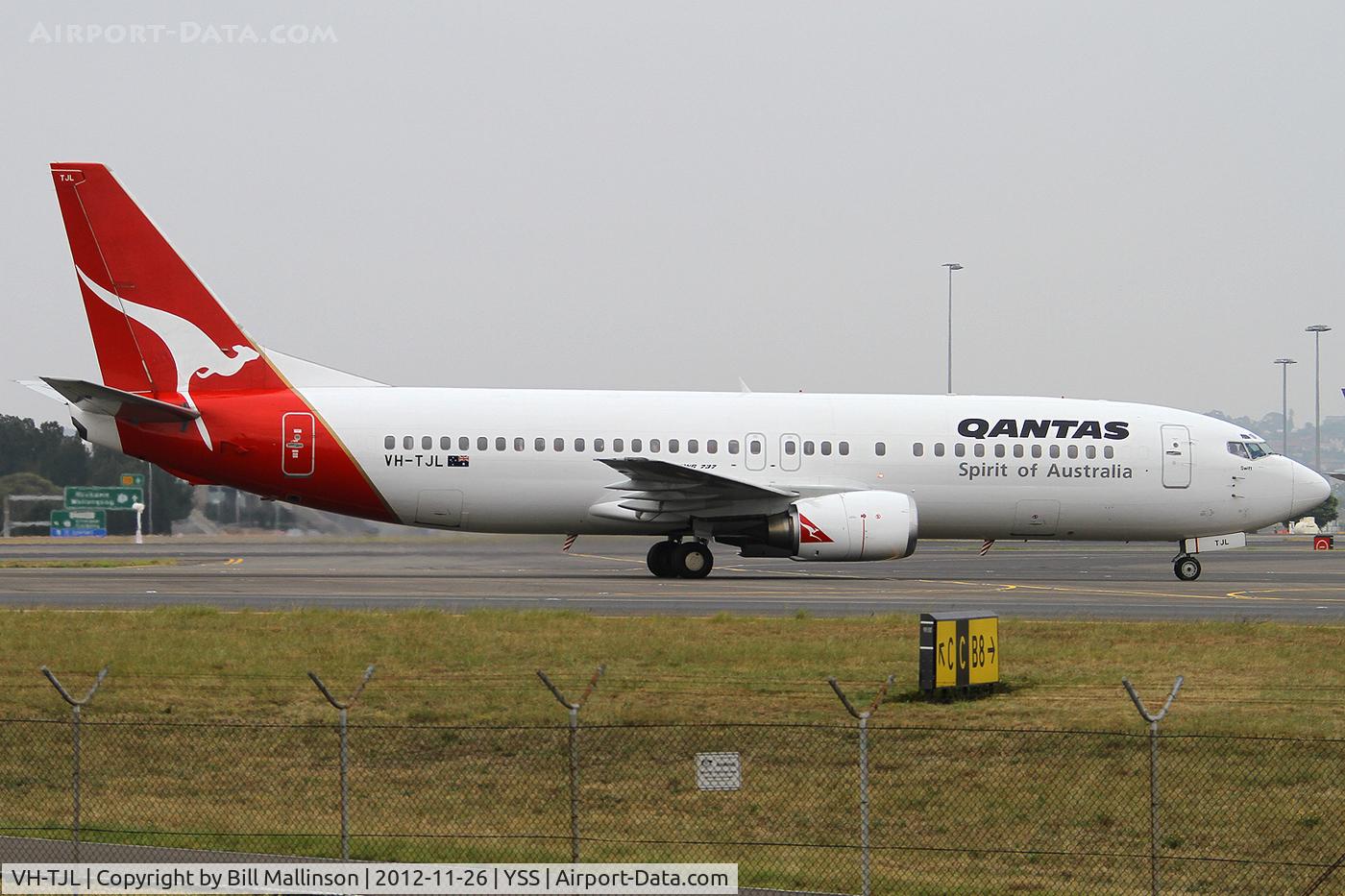 VH-TJL, 1991 Boeing 737-476 C/N 24437, taxiing from 34R