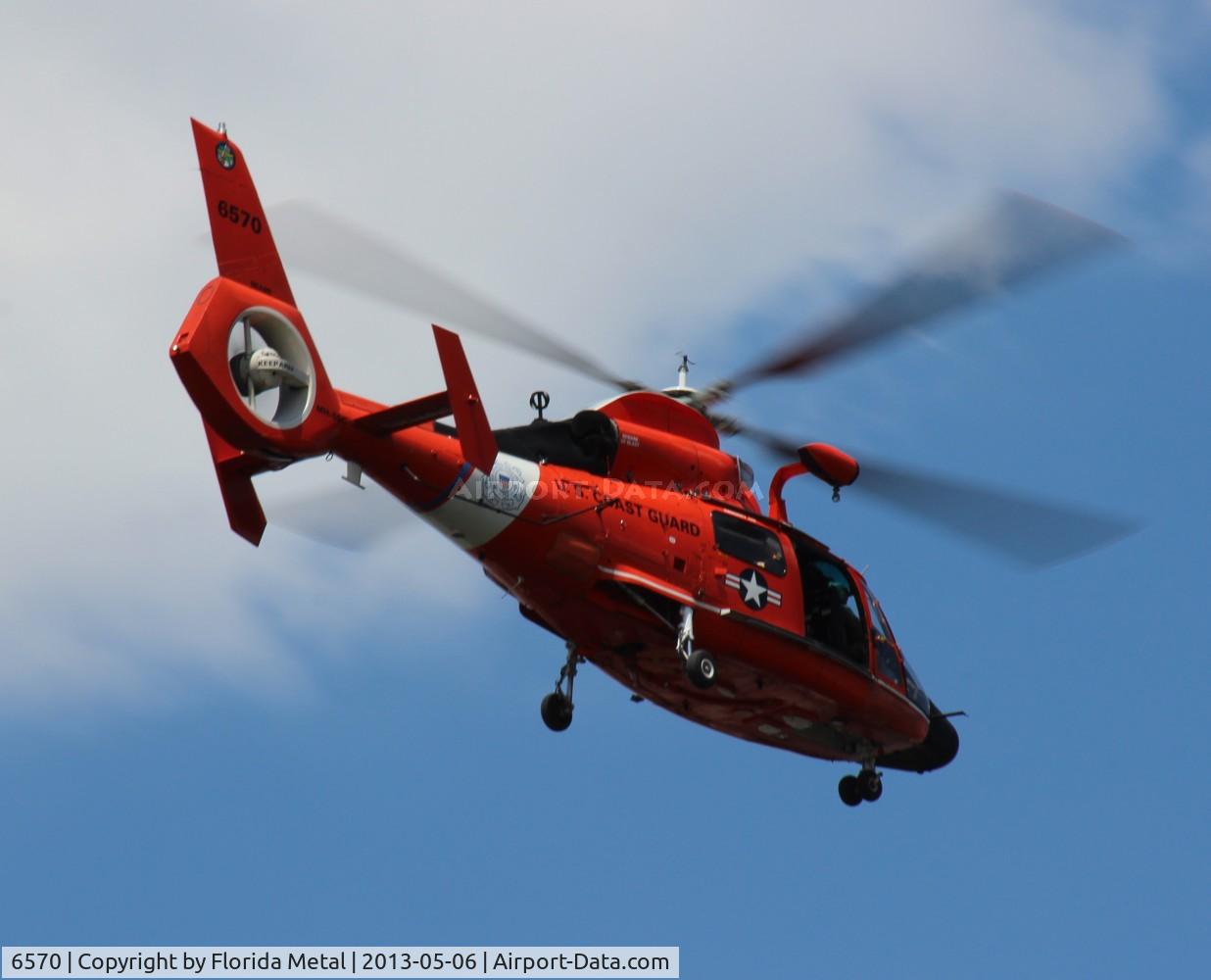 6570, Aerospatiale MH-65C Dolphin C/N 6265, US Coast Guard HH-65 Dolphin near Miami Airport flying over Blue Lagoon