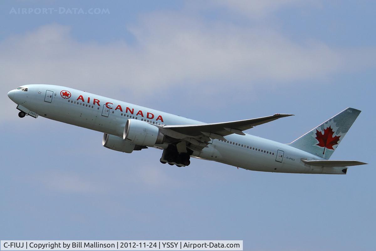 C-FIUJ, 2007 Boeing 777-233/LR C/N 35244, away from 34L