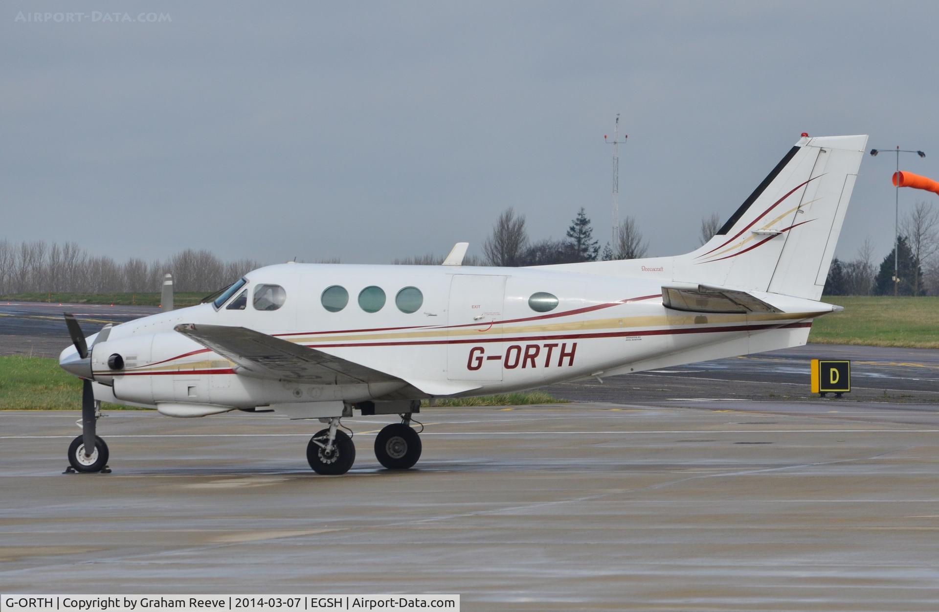 G-ORTH, 1975 Beech E90 King Air C/N LW-136, Parked at Norwich.