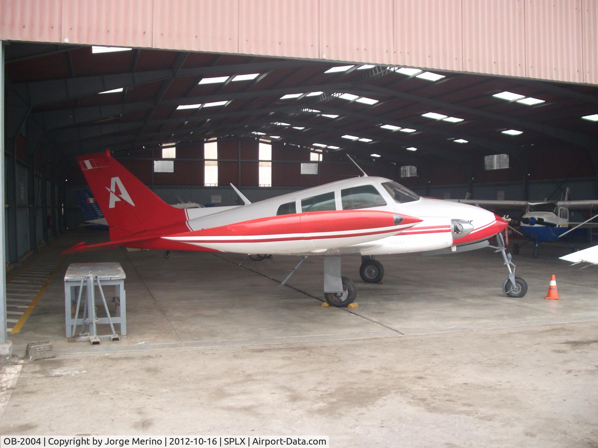 OB-2004, Cessna 310H C/N 310H0055, OB-2004 at the maintenance hangar, Lib Mandi airport (SPLX), Lima, Peru.