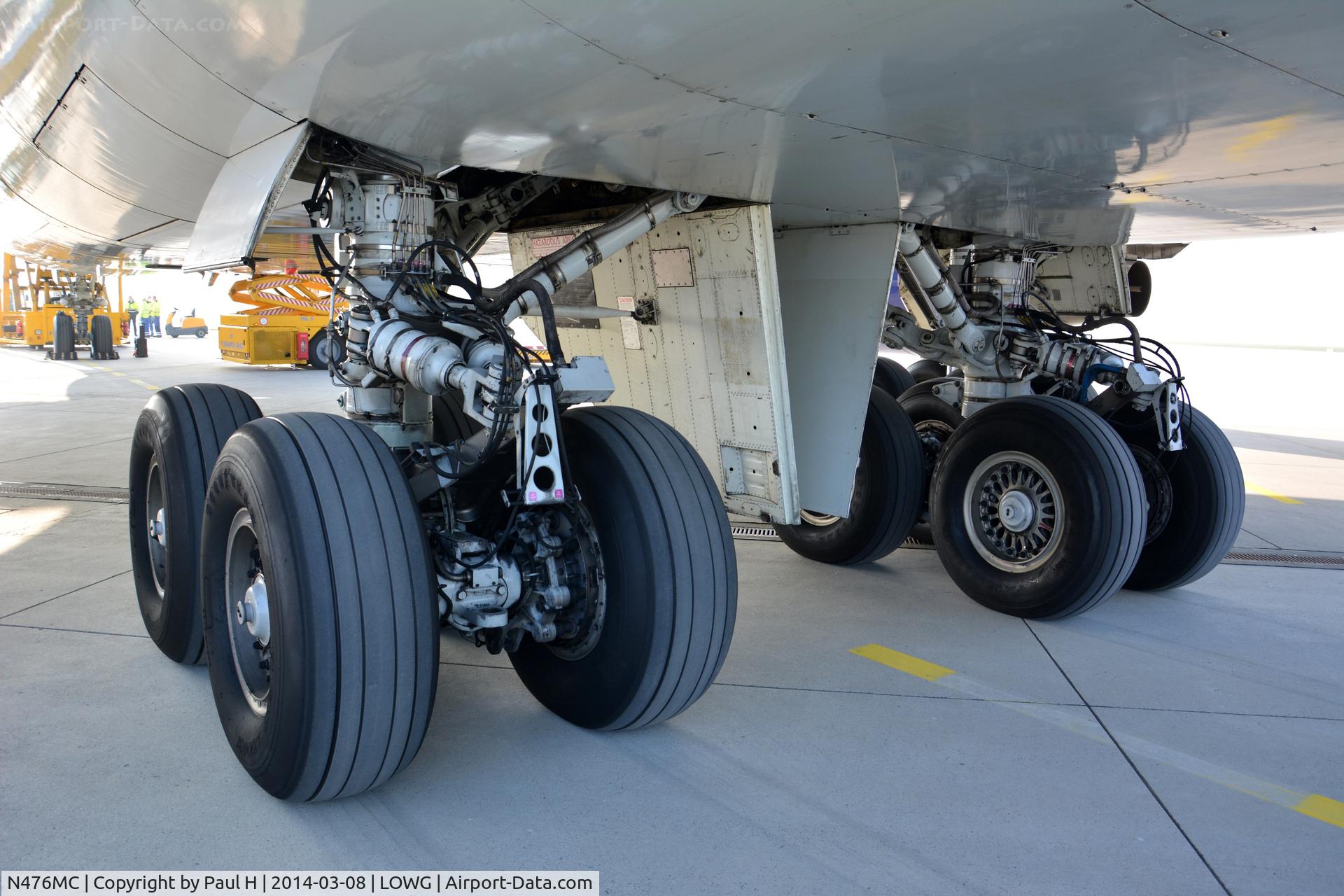 N476MC, 1999 Boeing 747-47UF C/N 29256, B-747 main gear from the ground