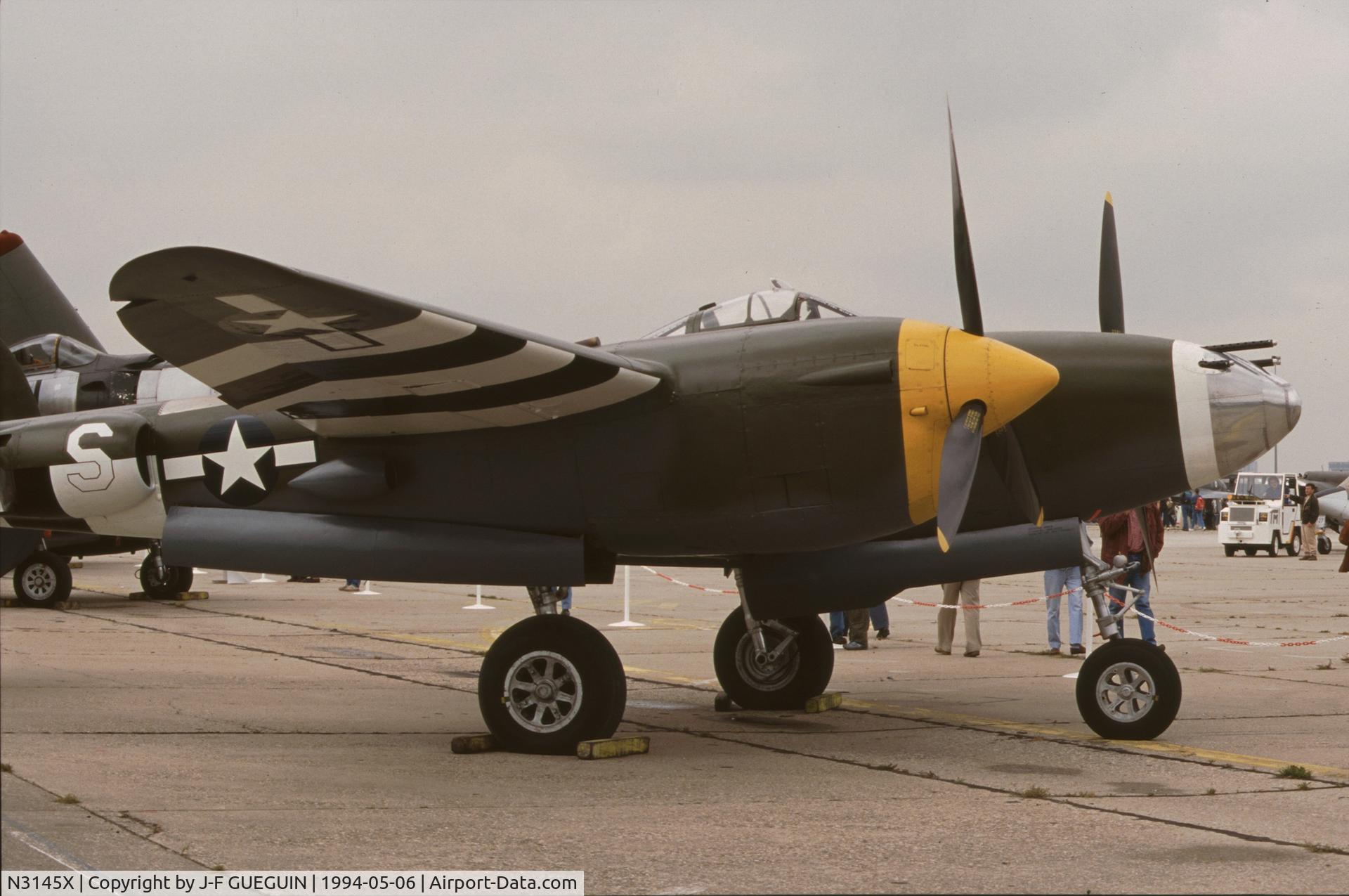 N3145X, 1943 Lockheed P-38J Lightning C/N 2054, On display at Le Bourget Airport (1er Salon de l'Aviation Ancienne), painted with serial 42-67916 and code KI-S (55th F. Sq., 20th F. Gr.).