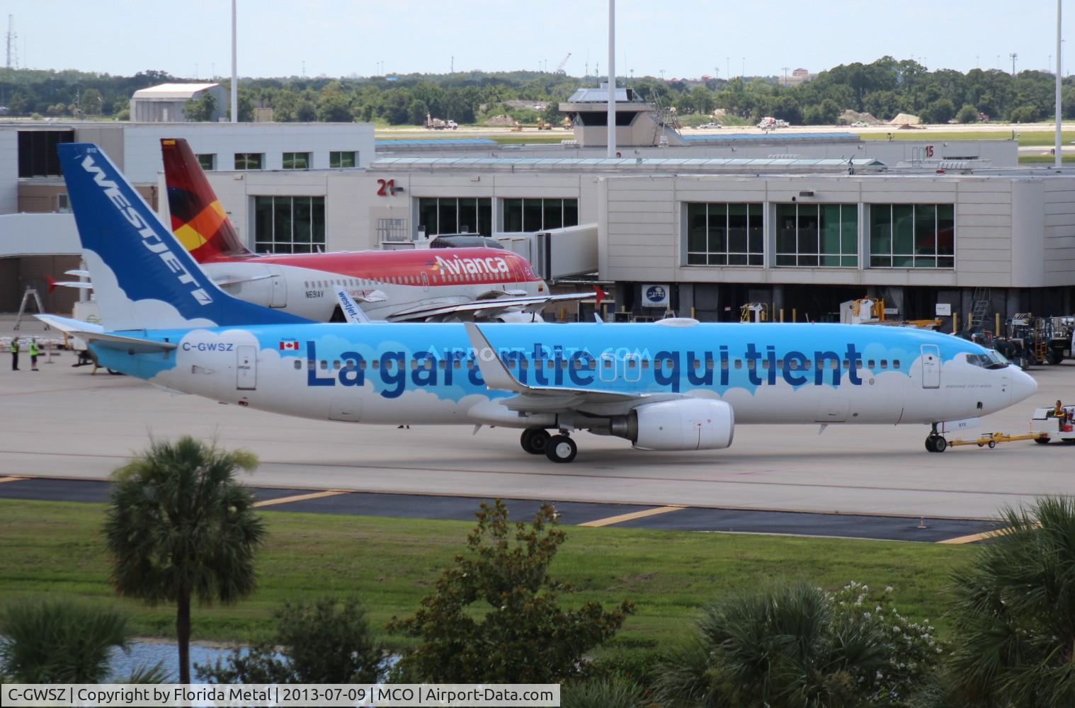 C-GWSZ, 2010 Boeing 737-8CT C/N 37092, West Jet La Garantie Qui Tient 737-800 recently painted over into the Disney plane