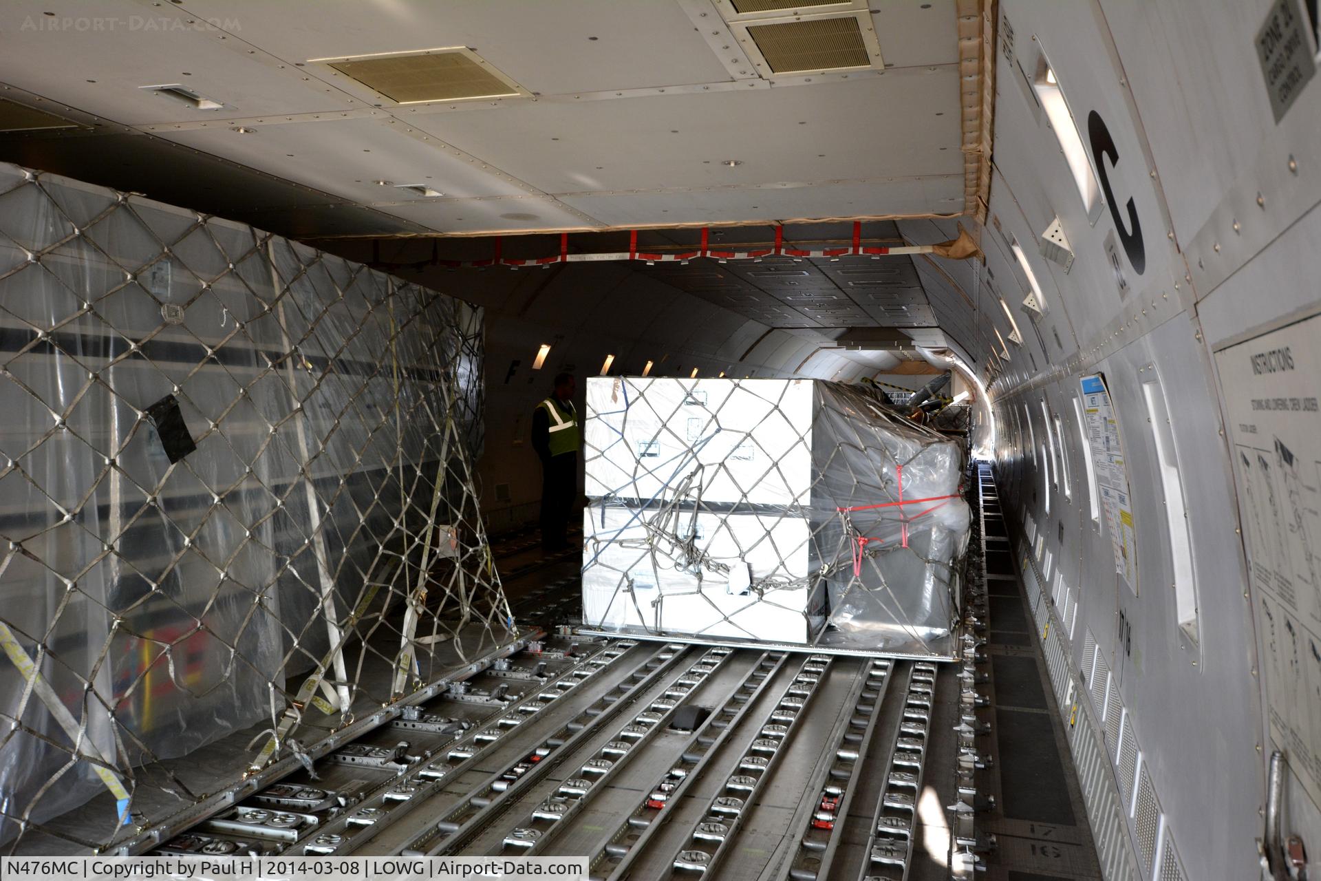 N476MC, 1999 Boeing 747-47UF C/N 29256, Intirior of an AtlasAir B-747F, during unloading, at Lowg