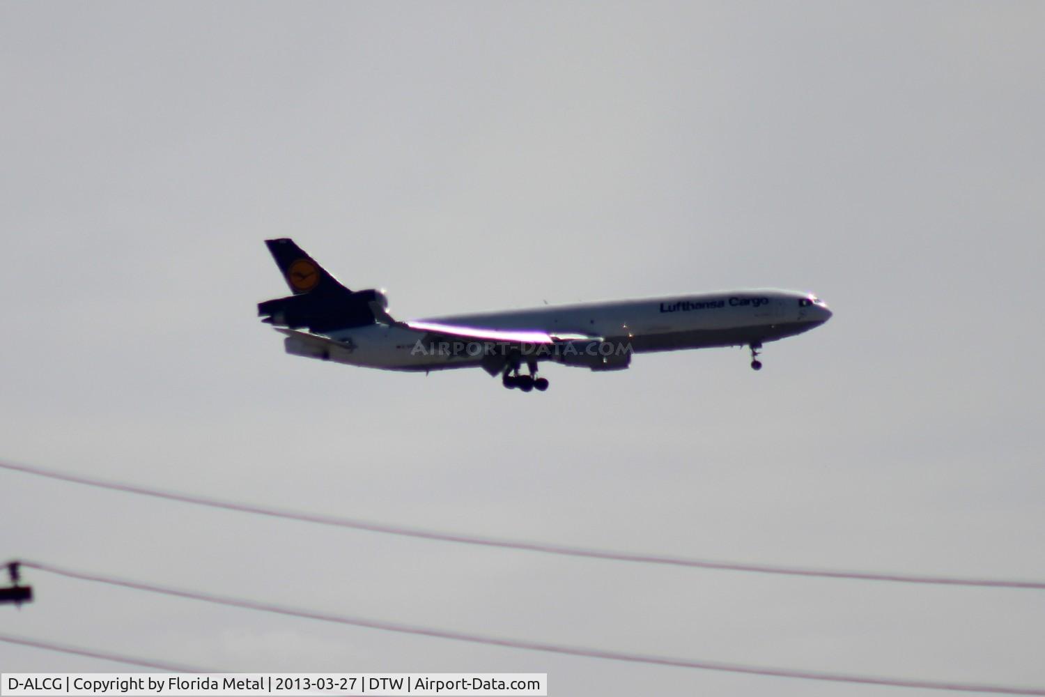 D-ALCG, 1999 McDonnell Douglas MD-11F C/N 48799, Wrong place at the wrong time.  Waiting by 22L for Lufthansa MD-11F to land since the facility is along 22L, but it lands 21L instead