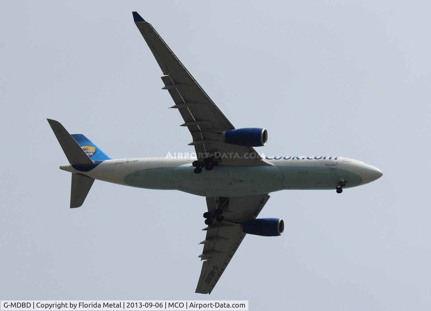 G-MDBD, 1999 Airbus A330-243 C/N 266, Surprise diversion from Sanford due to severe storms.  Thomas Cook A330-200 will be common site at MCO starting March 2014 as ops will move from SFB to MCO