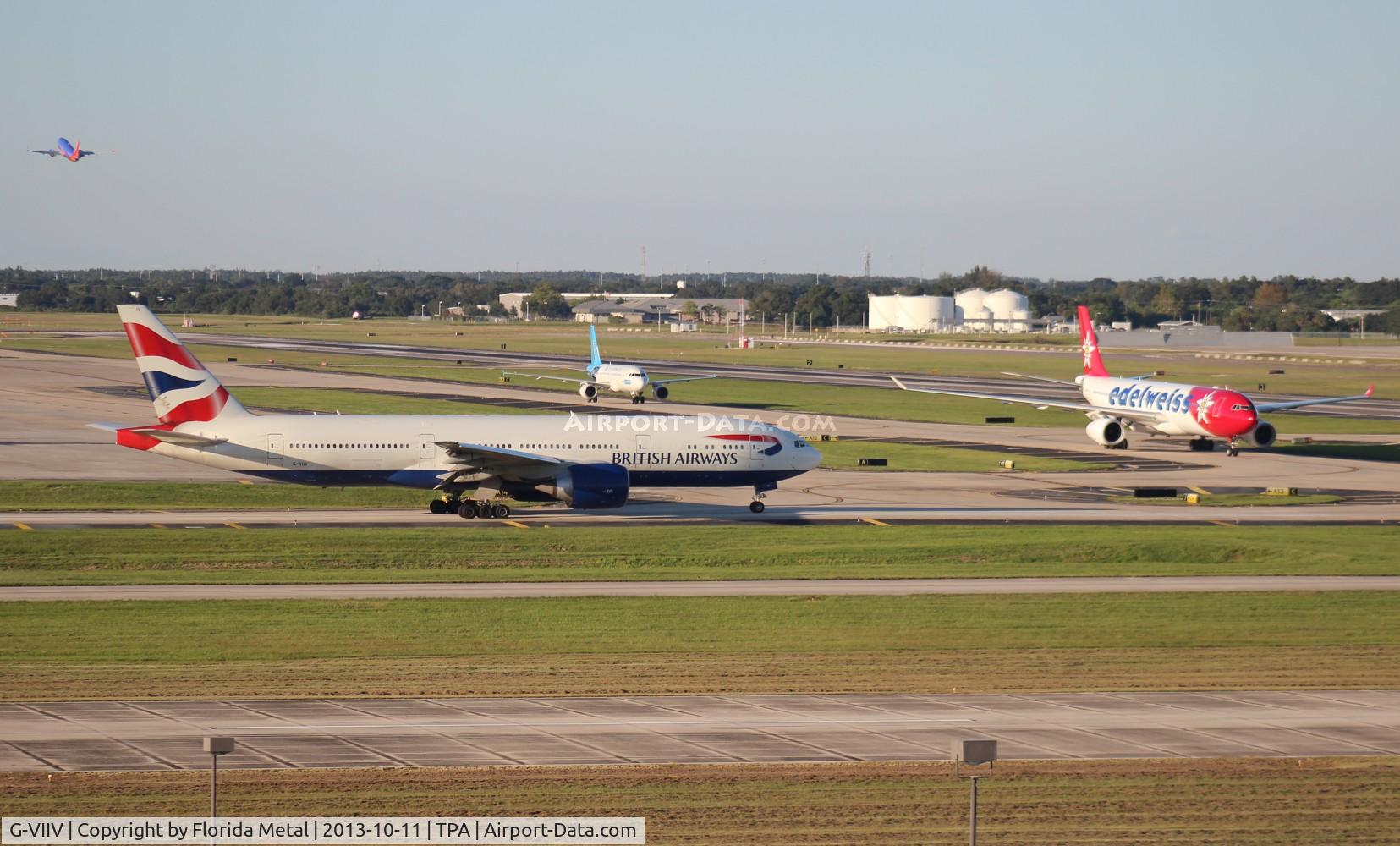 G-VIIV, 1999 Boeing 777-236 C/N 29964, British 777 and Edelweiss A330-300 about to meet face to face