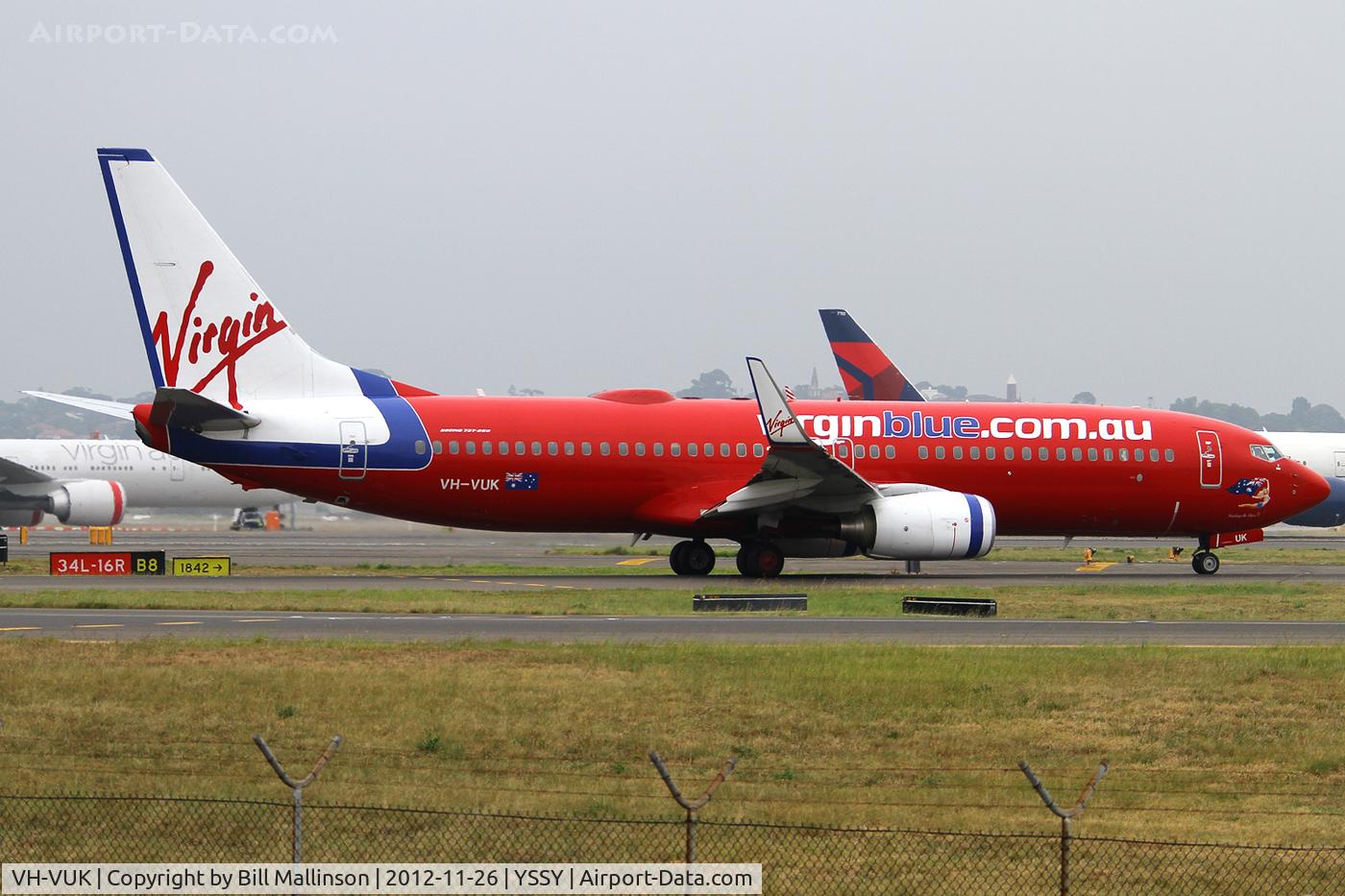 VH-VUK, 2007 Boeing 737-8FE C/N 36602/2353, taxiing from 16L