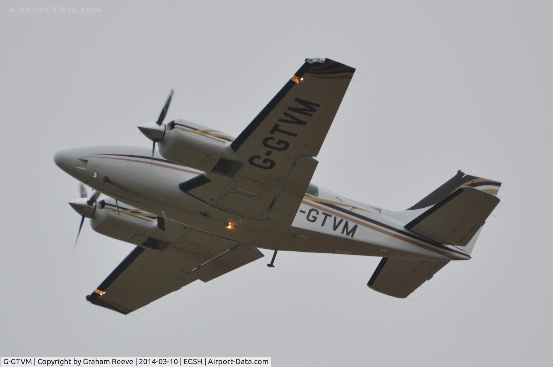 G-GTVM, 2000 Raytheon 58 Baron C/N TH-1944, On approach to Norwich.