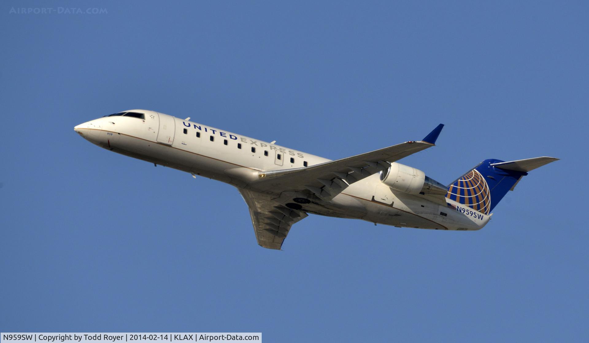 N959SW, 2003 Canadair CL-600-2B19 Regional Jet CRJ-200LR C/N 7840, Departing LAX on 25R