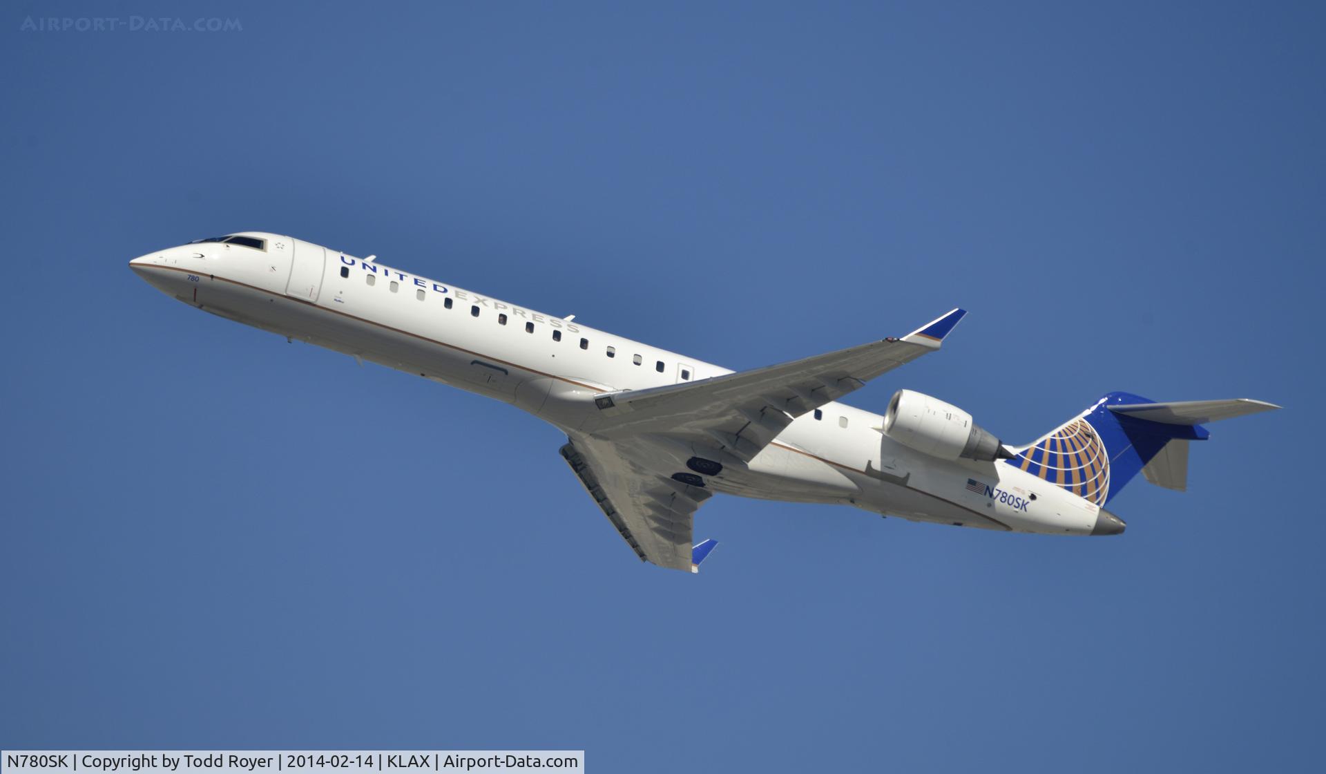 N780SK, 2009 Bombardier CRJ-700 (CL-600-2C10) Regional Jet C/N 10277, Departing LAX on 25R