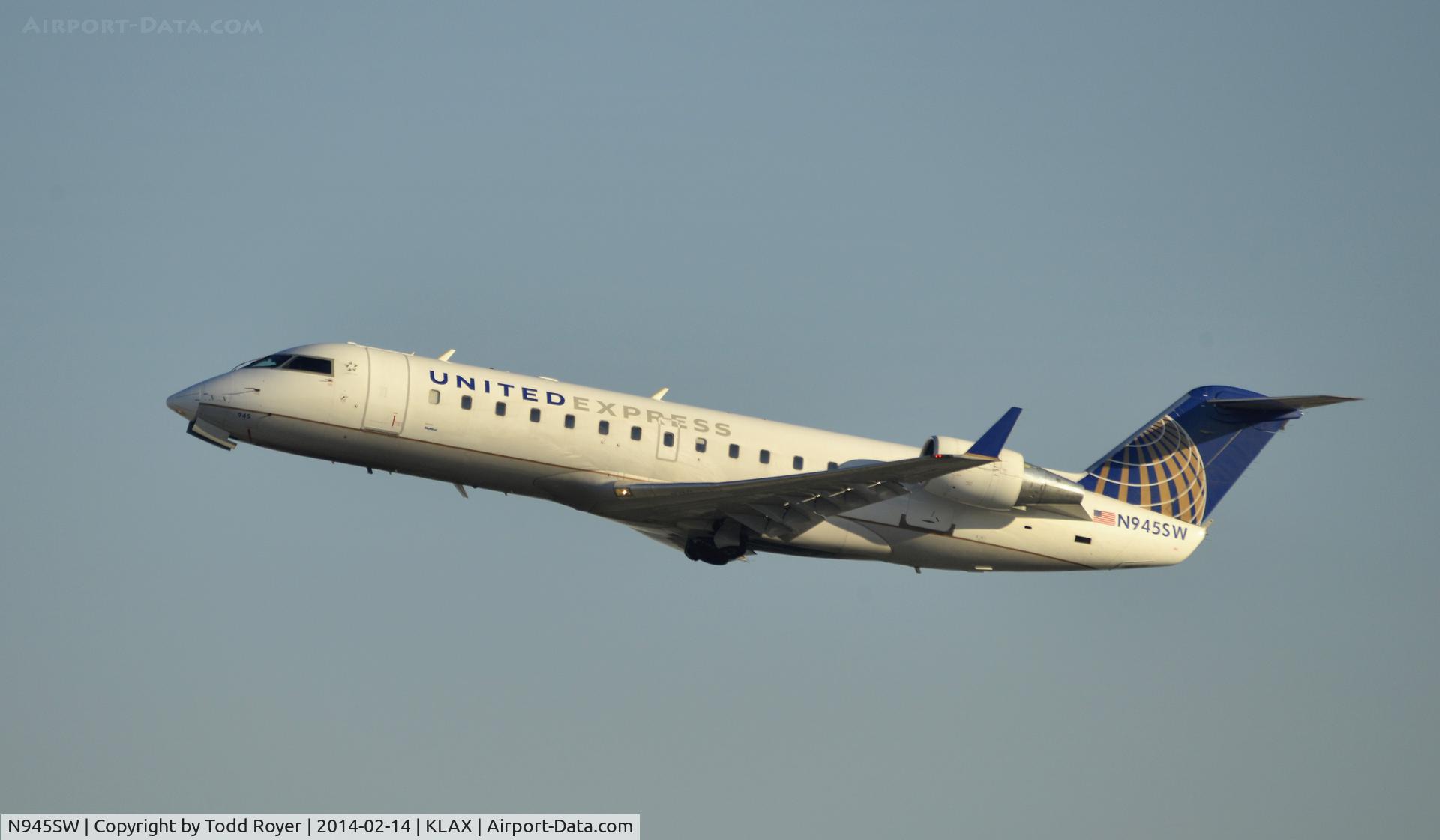 N945SW, 2003 Bombardier CRJ-200LR (CL-600-2B19) C/N 7770, Departing LAX on 25R