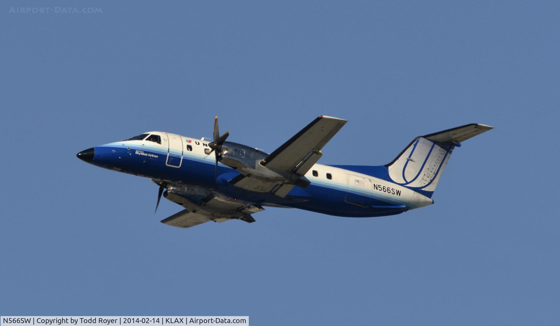 N566SW, 1998 Embraer EMB-120ER Brasilia C/N 120341, Departing LAX on 25R