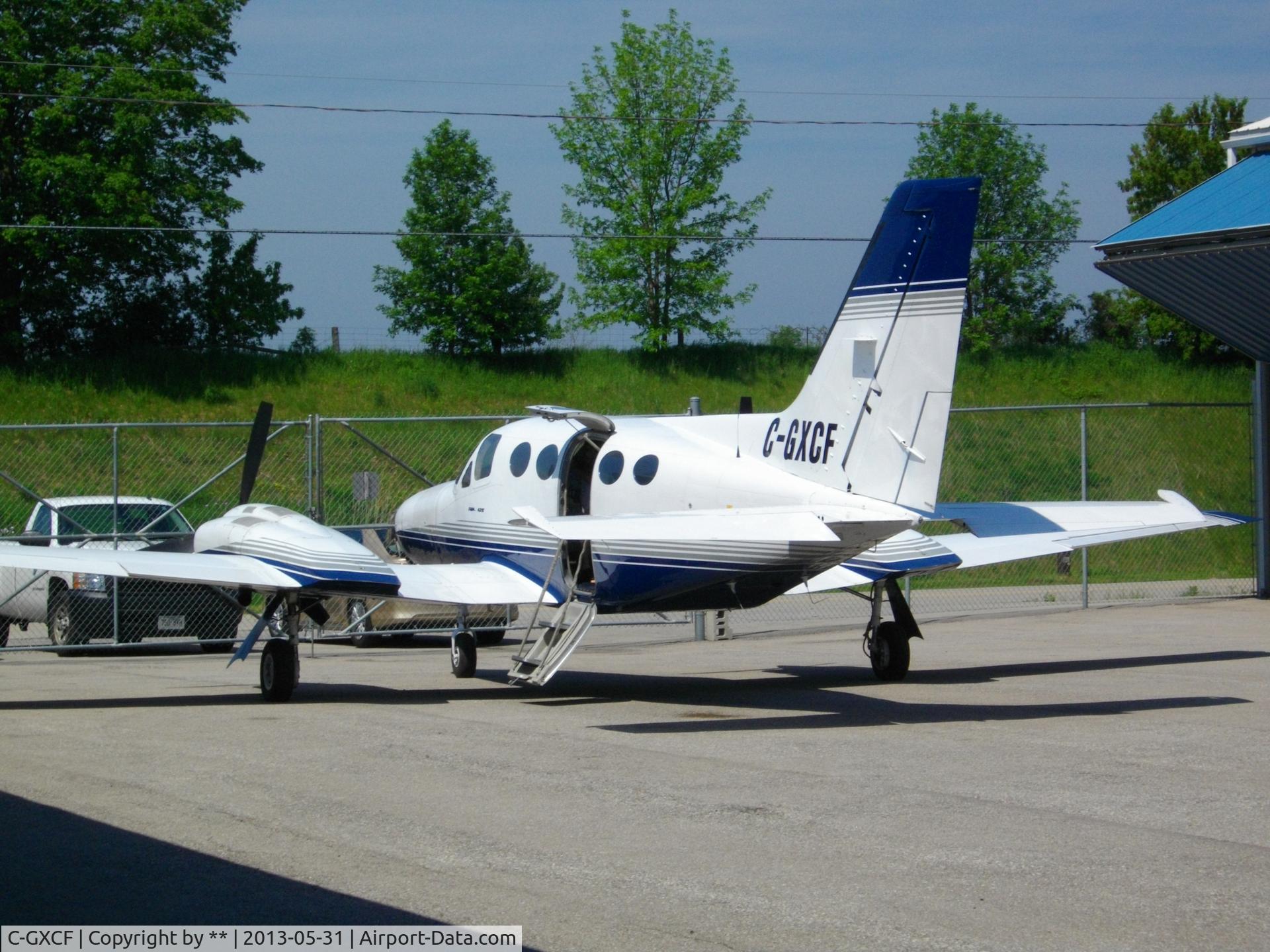 C-GXCF, 1976 Cessna 421C Golden Eagle C/N 421C0083, Parked at CYKF
