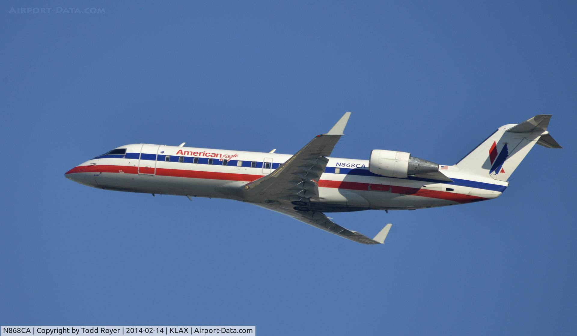 N868CA, 2000 Bombardier CRJ-100ER (CL-600-2B19) C/N 7427, Departing LAX on 25R