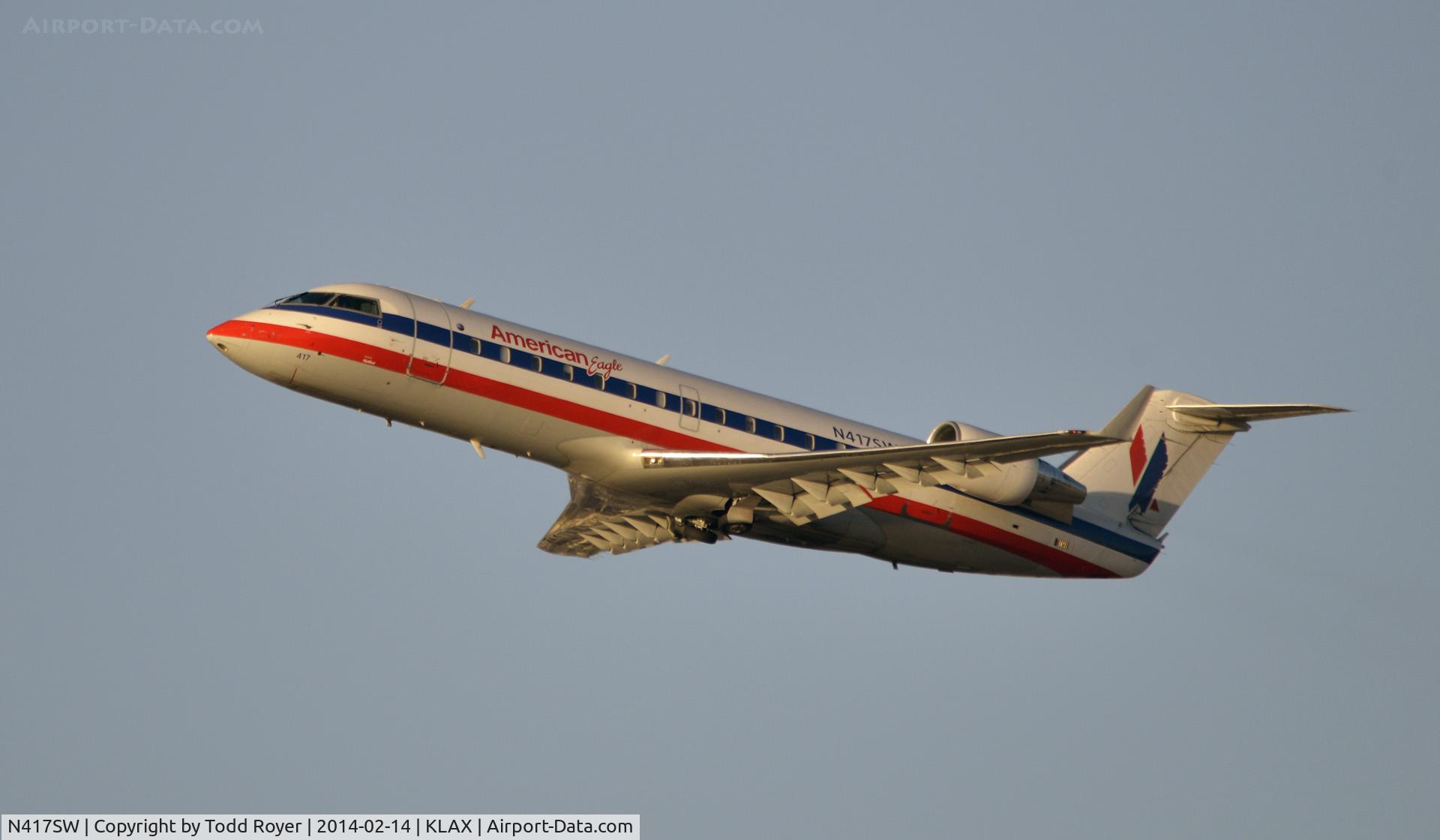 N417SW, 2000 Bombardier CRJ-200LR (CL-600-2B19) C/N 7400, Departing LAX on 25R