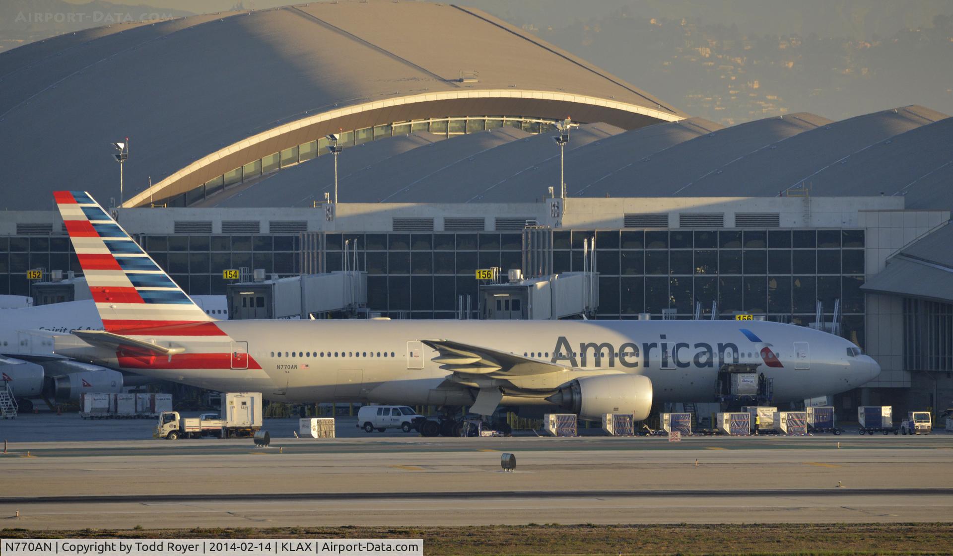 N770AN, 1999 Boeing 777-223 C/N 29578, Loading cargo at LAX