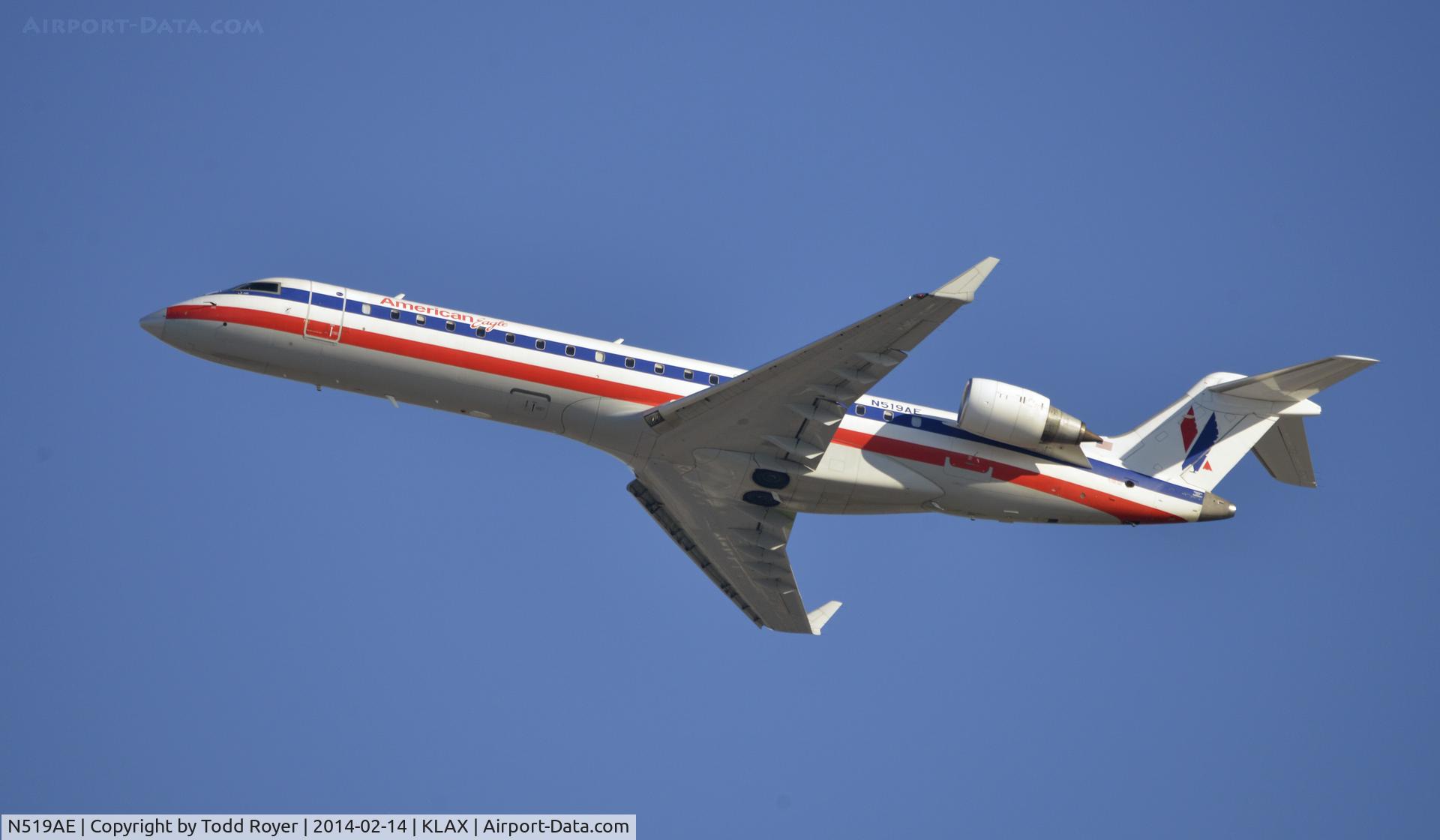 N519AE, 2003 Bombardier CRJ-701 (CL-600-2C10) Regional Jet C/N 10131, Departing LAX on 25R