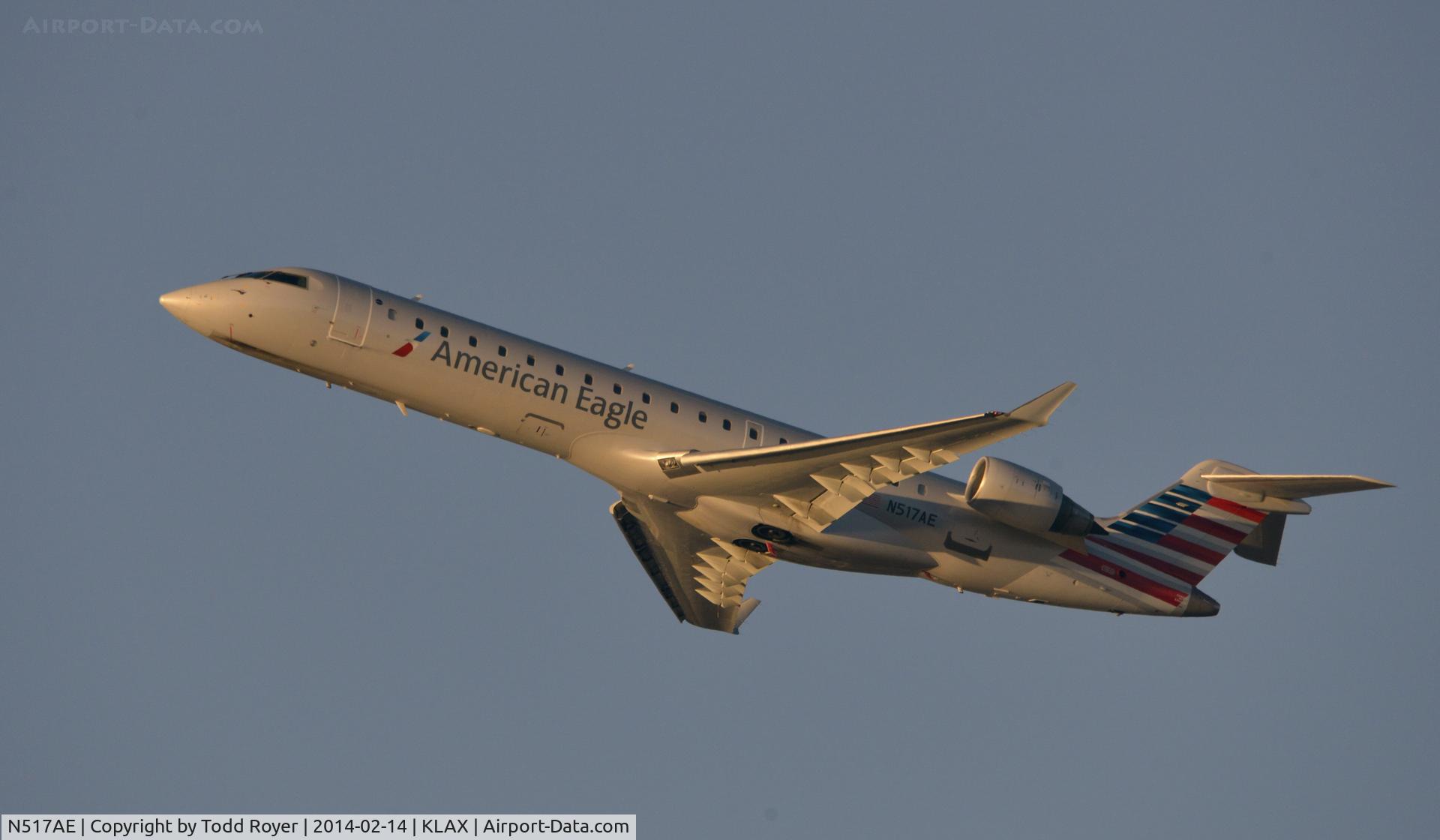 N517AE, 2003 Bombardier CRJ-701ER (CL-600-2C10) Regional Jet C/N 10124, Departing LAX on 25R