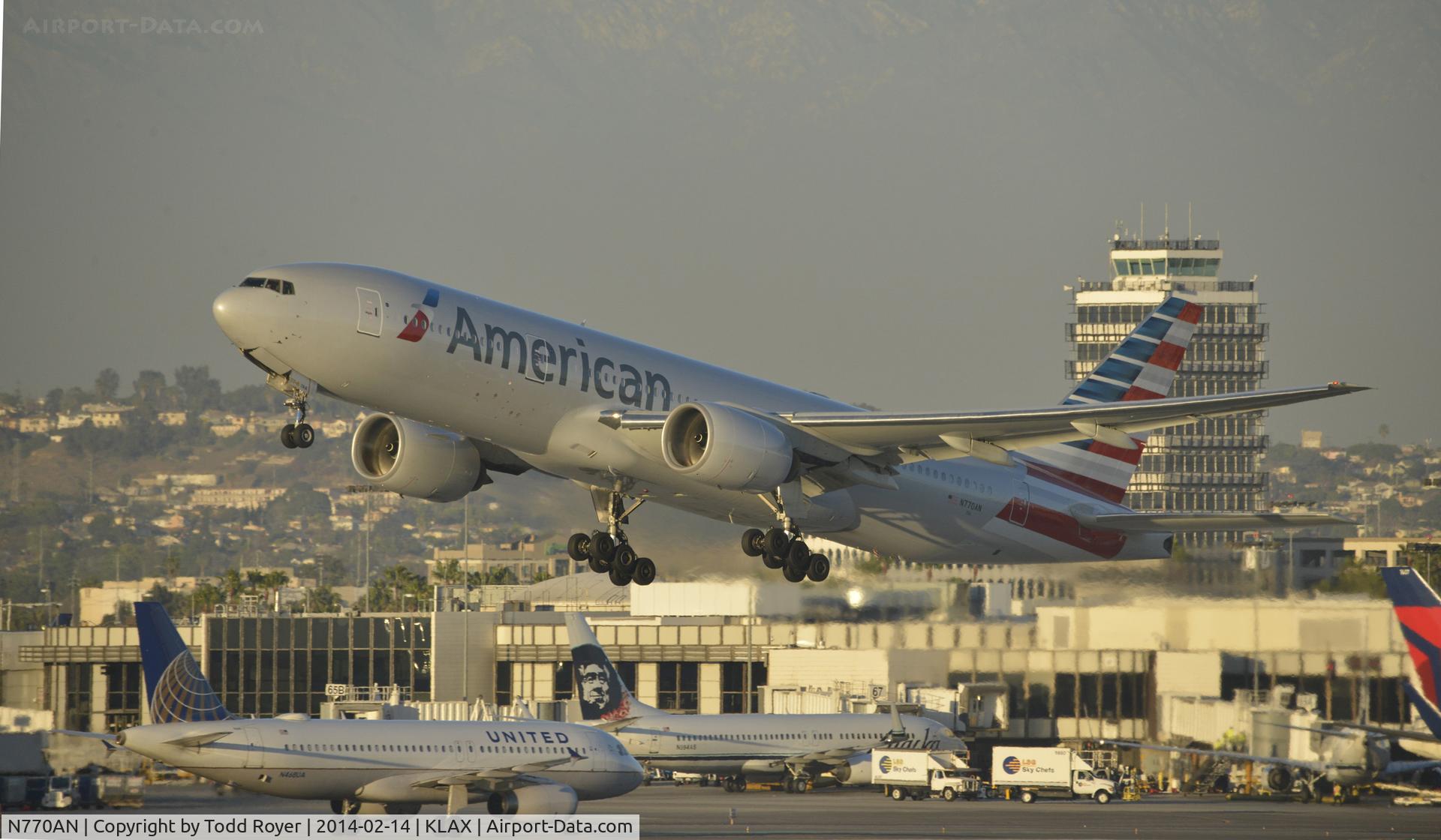 N770AN, 1999 Boeing 777-223 C/N 29578, Departing LAX on 25R