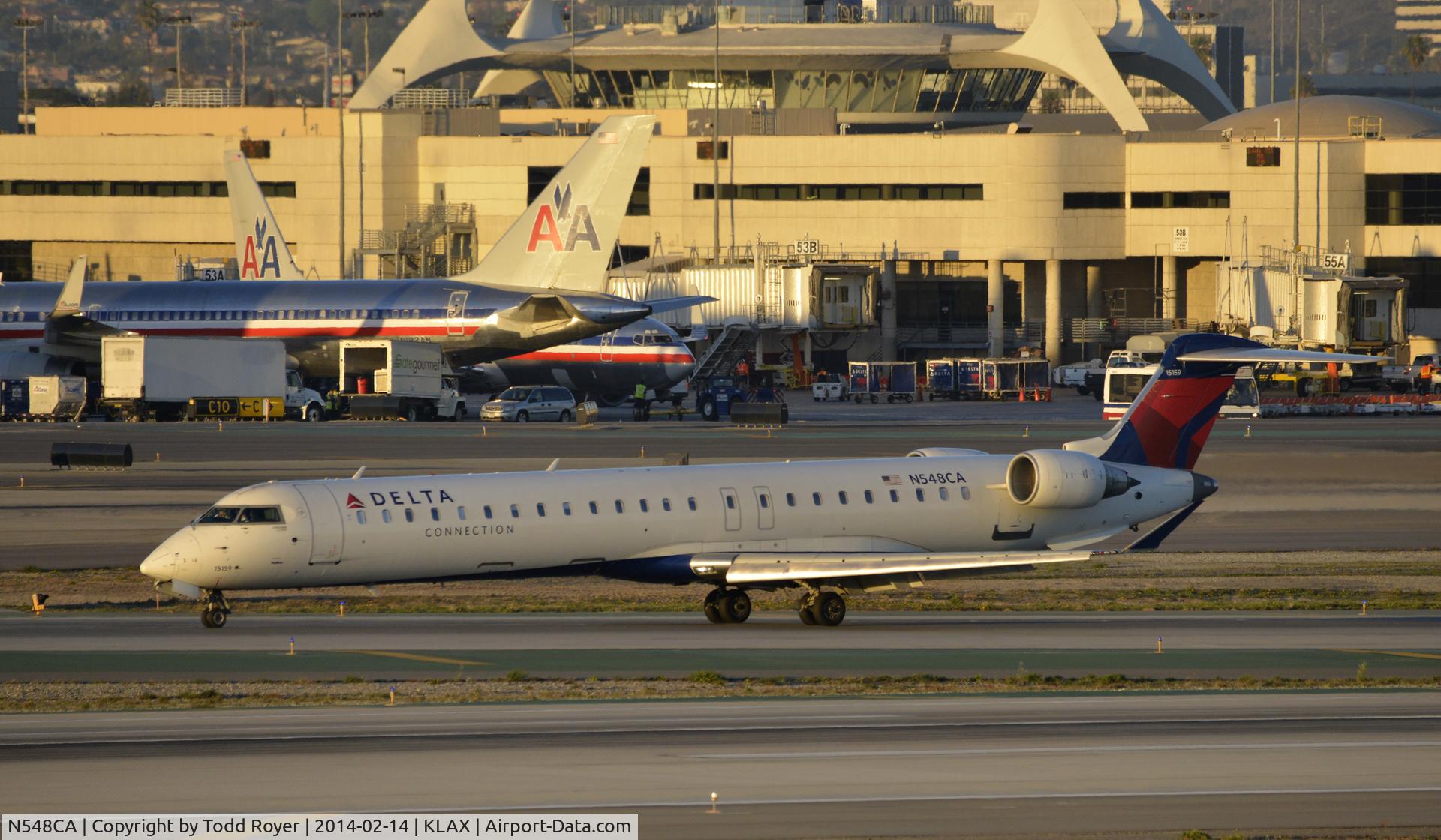 N548CA, 2008 Bombardier CRJ-900ER (CL-600-2D24) C/N 15159, Taxiing to gate at LAX