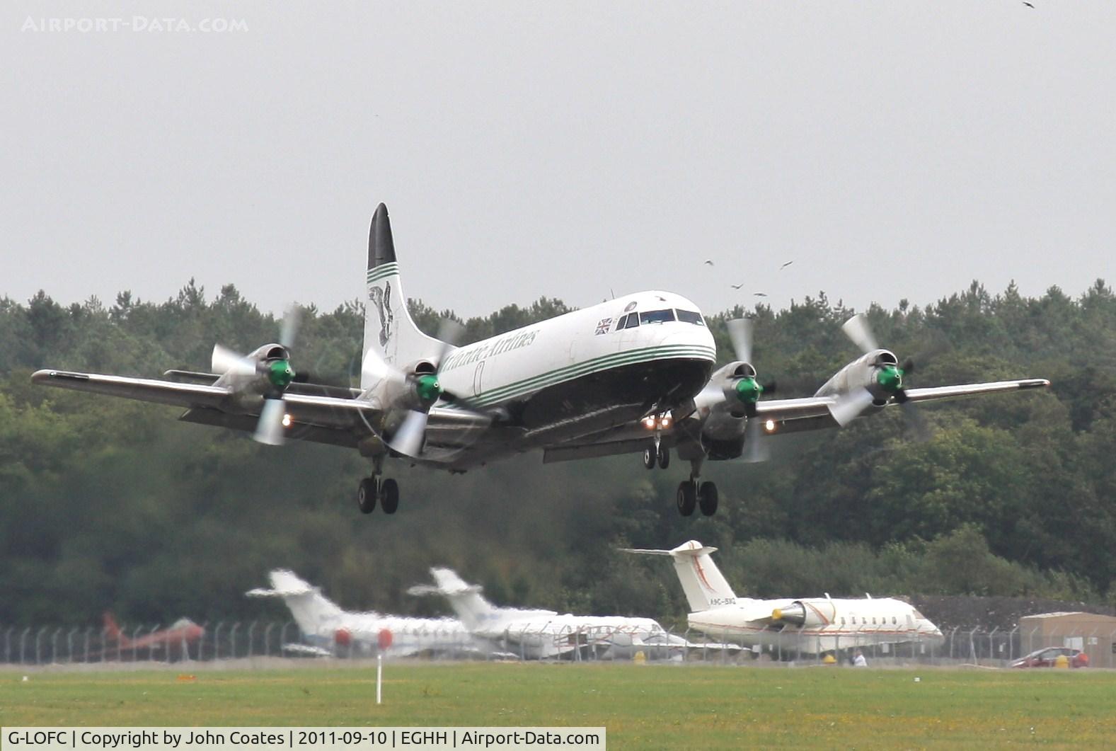 G-LOFC, 1959 Lockheed L-188C(F) Electra C/N 1100, Departing off 26