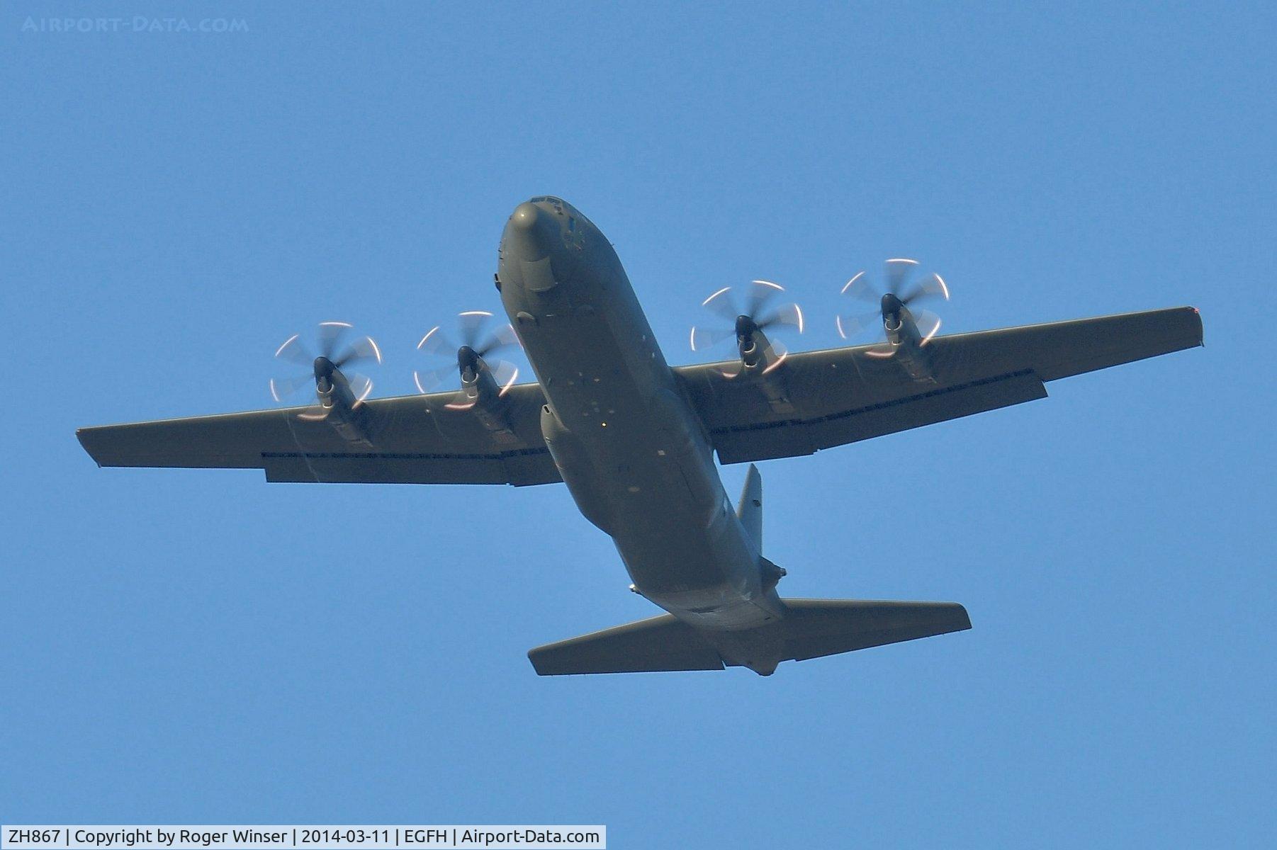 ZH867, 1997 Lockheed Martin C-130J-30 Hercules C.4 C/N 382-5416, RAF Hercules C.4 aircraft coded 867 of the Brize Norton Transport Wing flies over Swansea Airport.