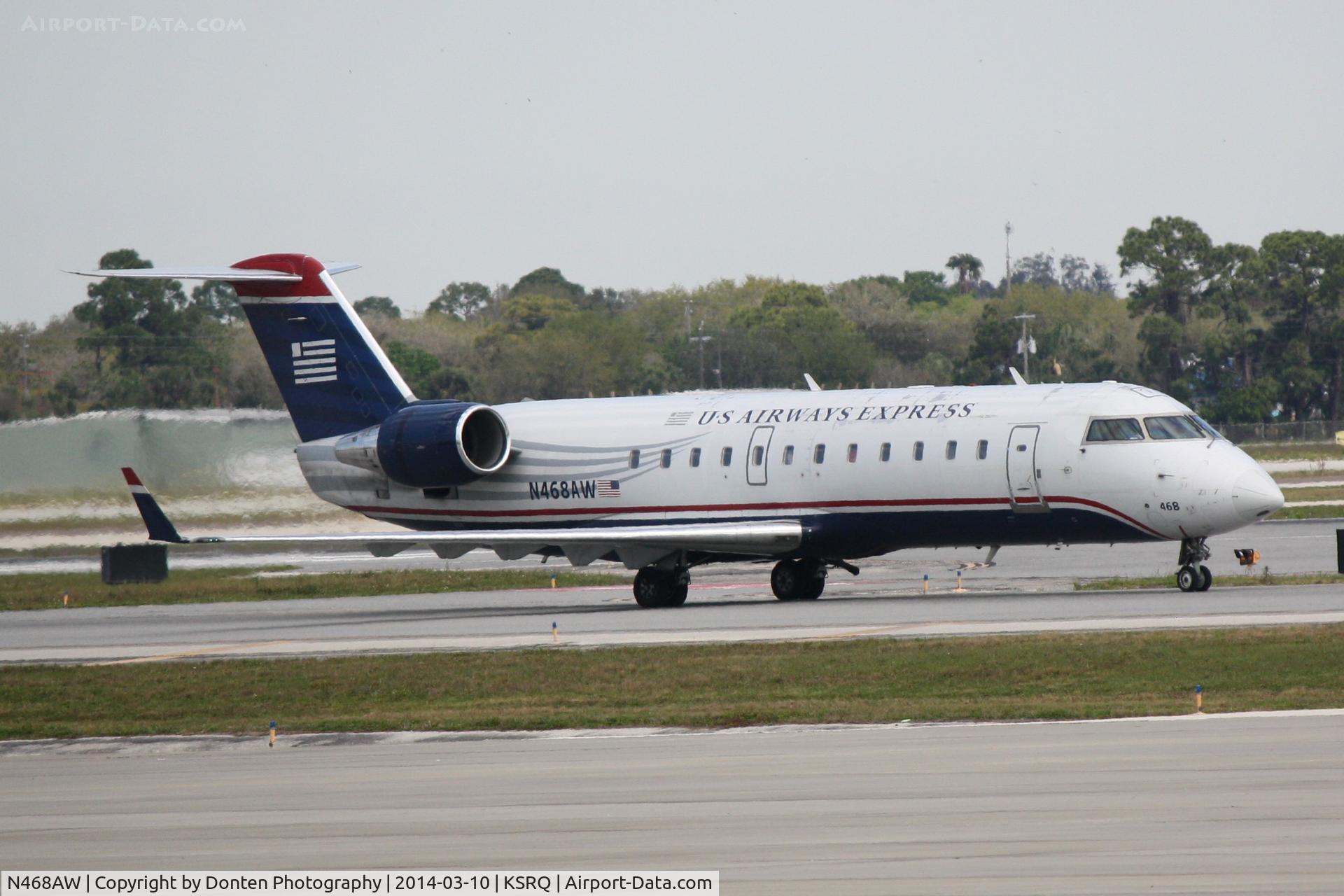 N468AW, 2004 Bombardier CRJ-200LR (CL-600-2B19) C/N 7916, US Air Flight 4078 operated by Air Wisconsin (N468AW) taxis at Sarasota-Bradenton International Airport