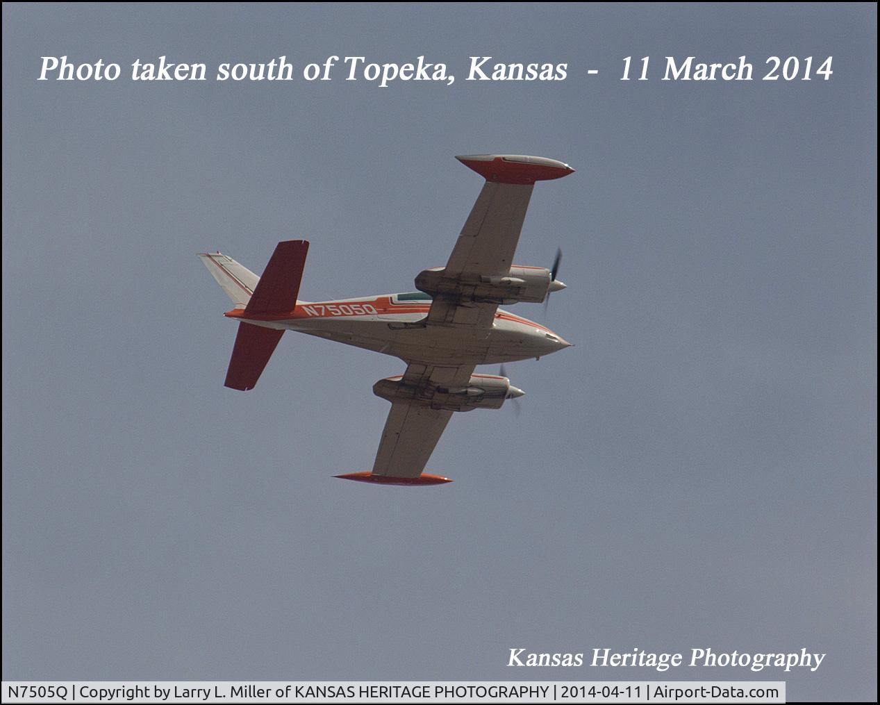 N7505Q, 1969 Cessna 310Q C/N 310Q0005, I took the photo as the aircraft flew over my property located south of Topeka, Kansas near Wakarusa, Kansas the afternoon of 11 March 2014.  The aircraft was headed south.