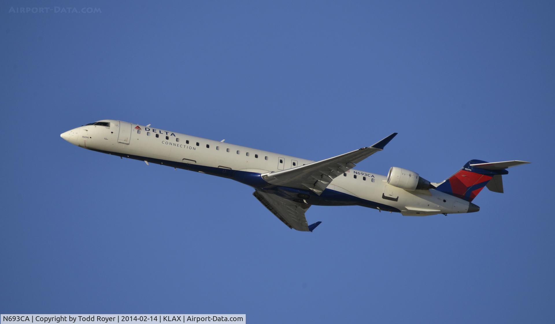 N693CA, 2006 Bombardier CRJ-900ER (CL-600-2D24) C/N 15096, Departing LAX on 25R