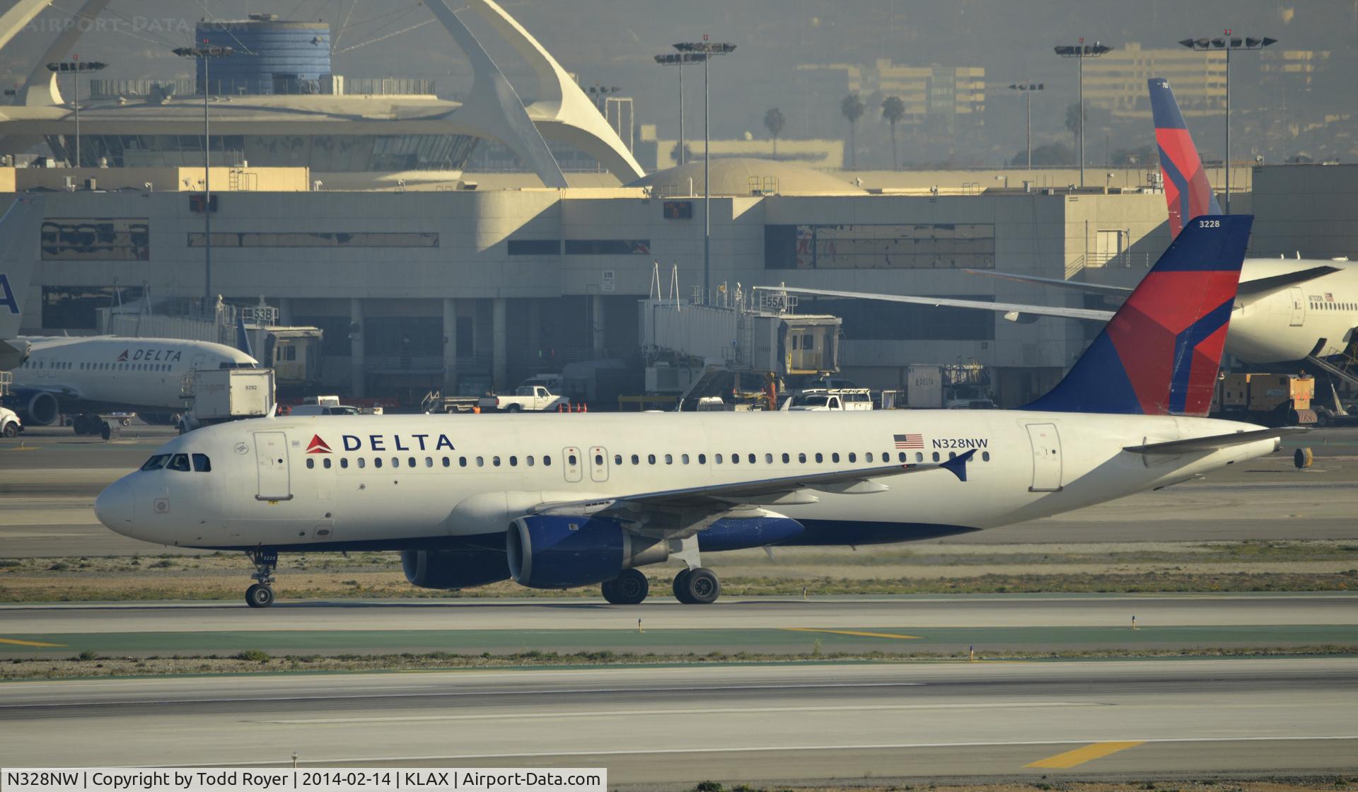 N328NW, 1992 Airbus A320-211 C/N 298, Taxiing to gate at LAX
