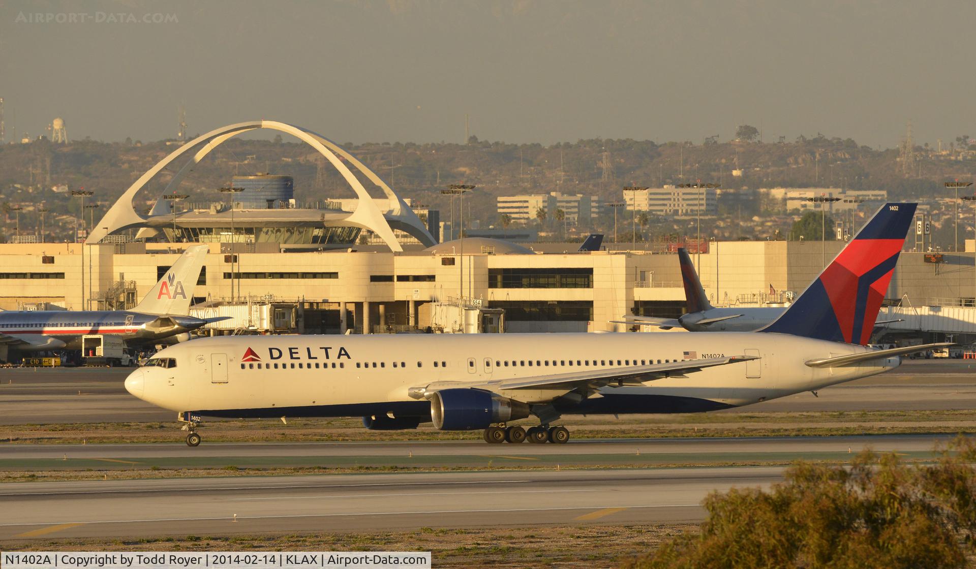 N1402A, 1993 Boeing 767-332 C/N 25989, Taxiing to gate at LAX