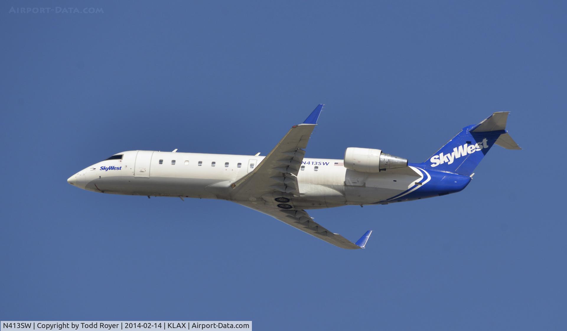 N413SW, 1996 Canadair CL-600-2B19 Regional Jet CRJ-100LR C/N 7102, Departing LAX on 25R