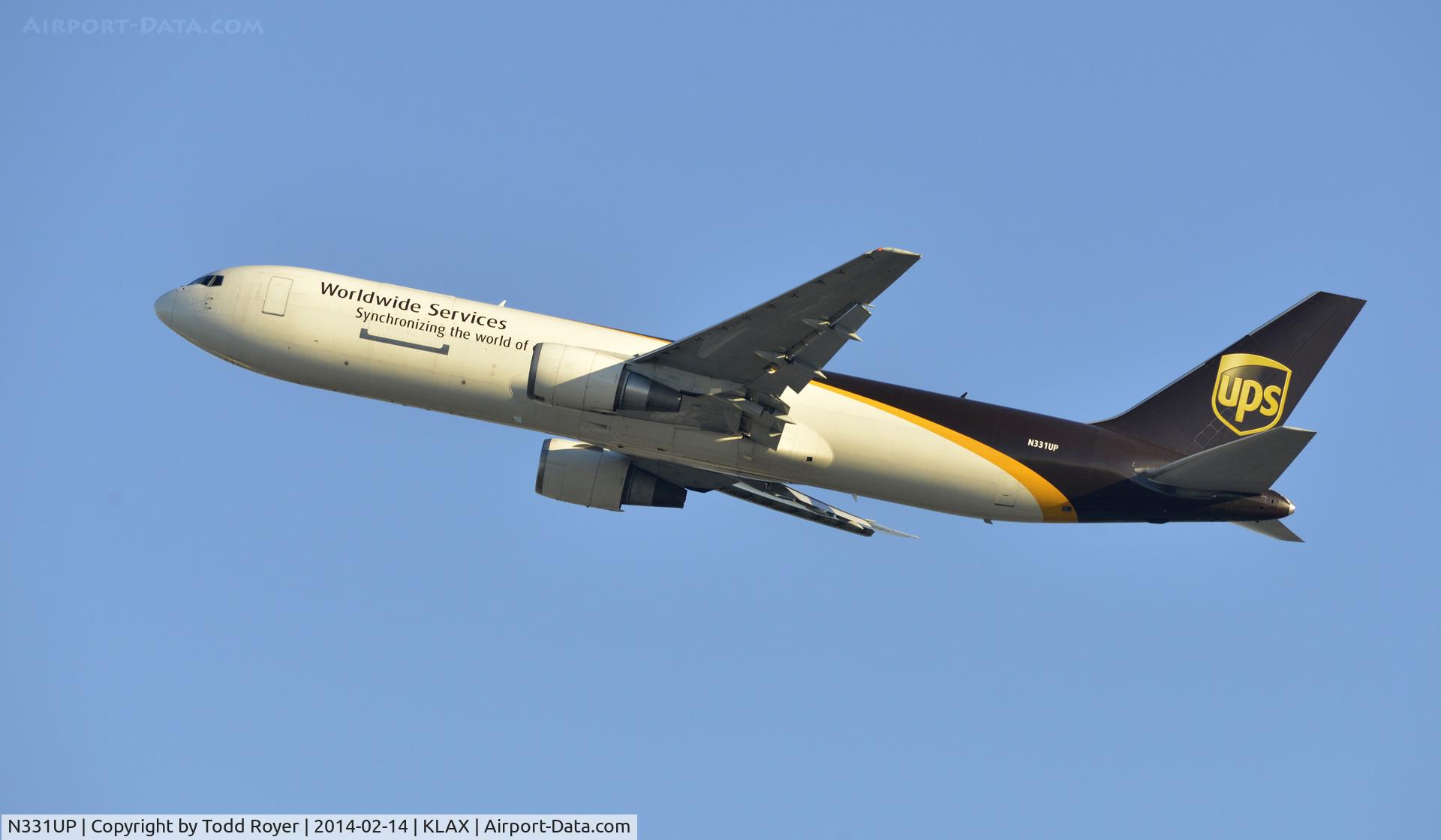 N331UP, 1999 Boeing 767-34AF C/N 27757, Departing LAX on 25R