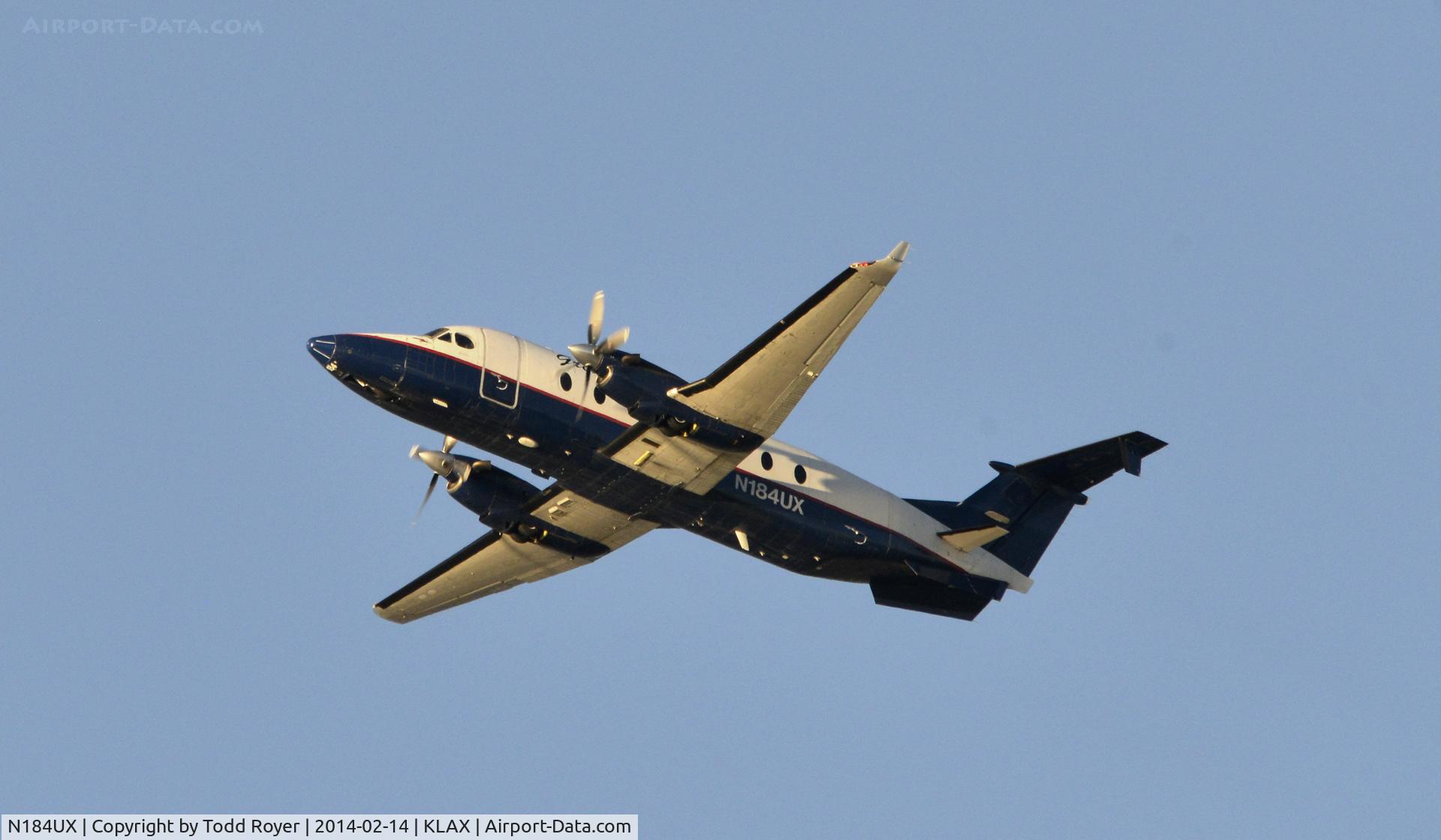 N184UX, 1995 Beech 1900D C/N UE-184, Departing LAX on 25R