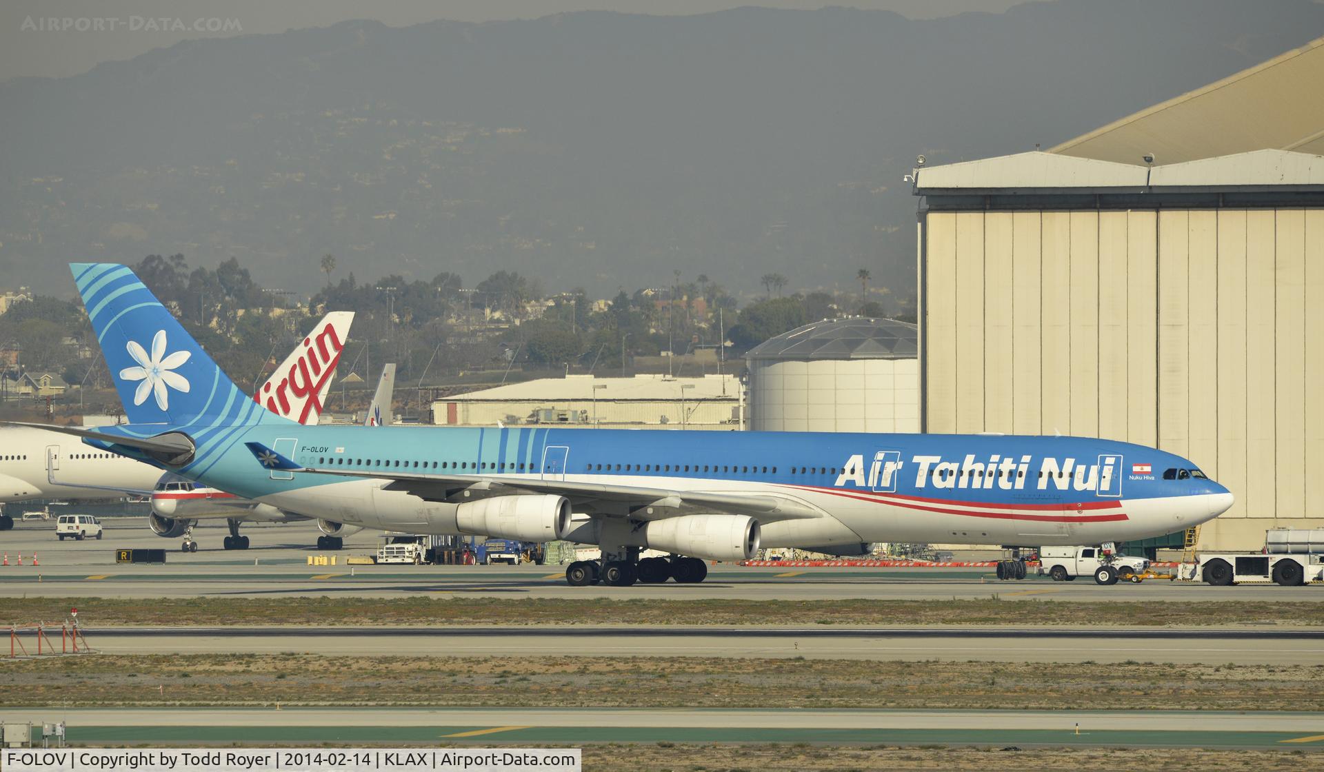 F-OLOV, 2005 Airbus A340-313 C/N 668, Taxiing to gate at LAX