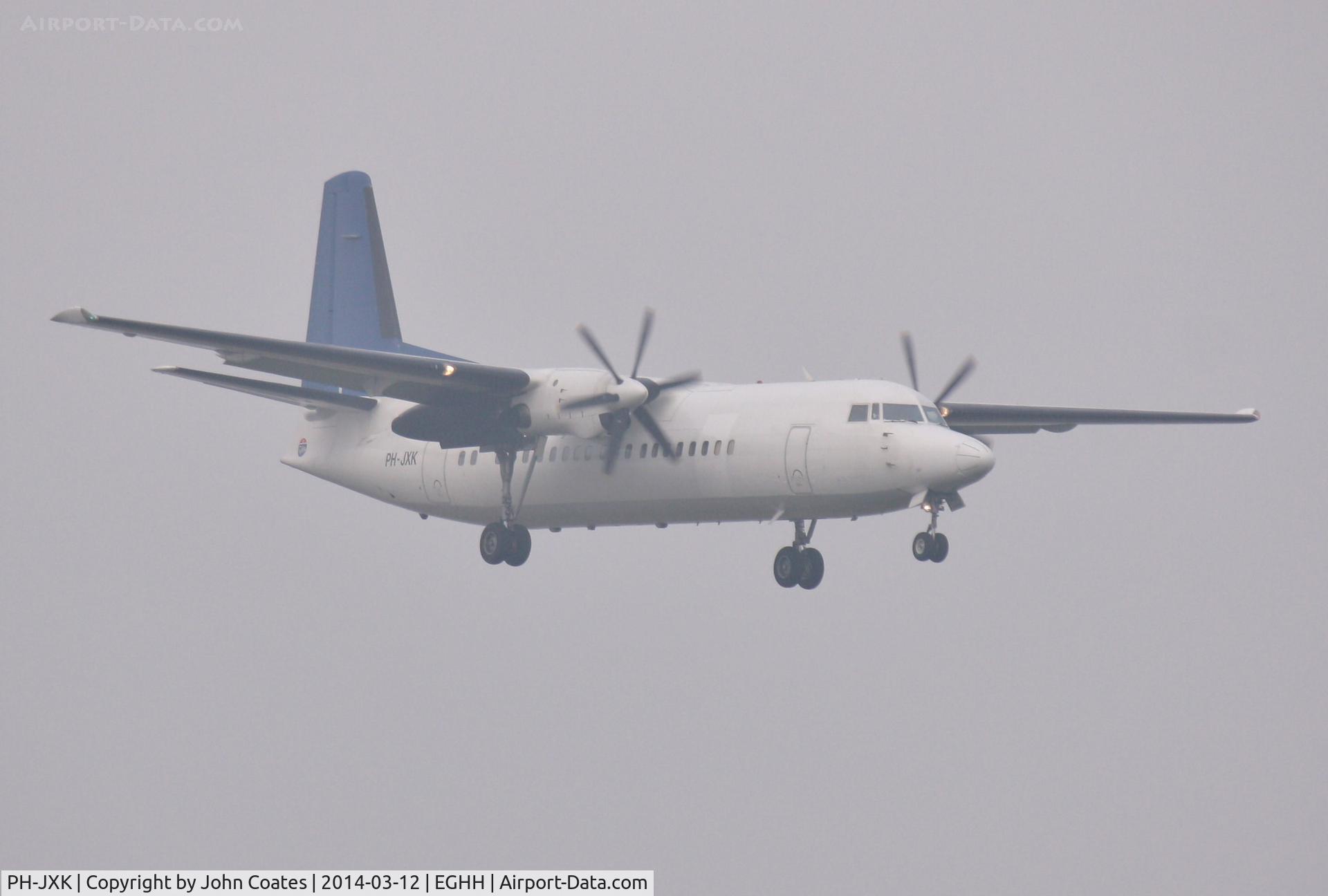 PH-JXK, 1991 Fokker 50 C/N 20233, Appearing through the early morning fog !