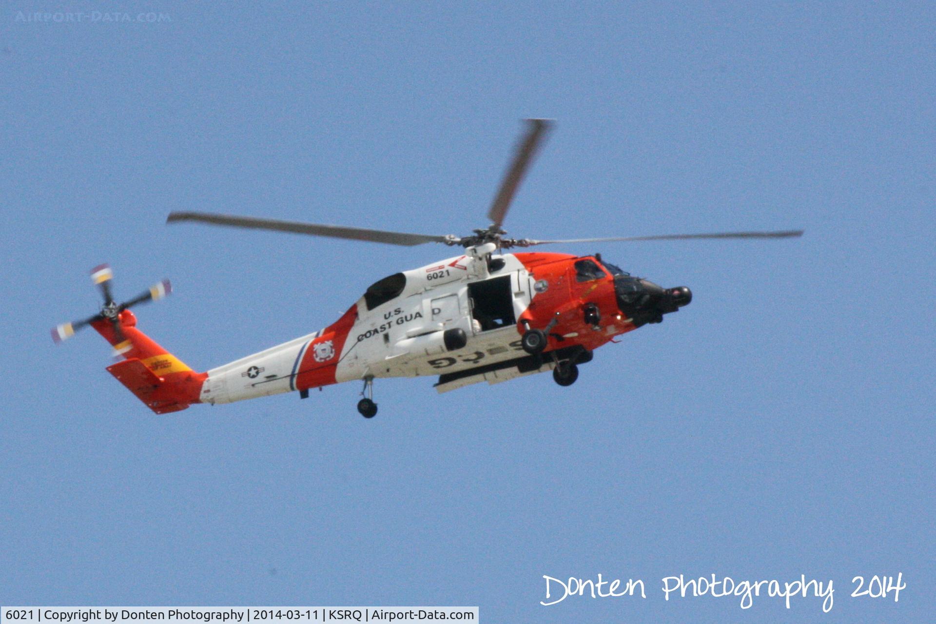 6021, Sikorsky MH-60J Jayhawk C/N 70.1703, USCG HH-60 Jayhawk (6021) from Air Station Clearwater flies over Sarasota-Bradenton International Airport
