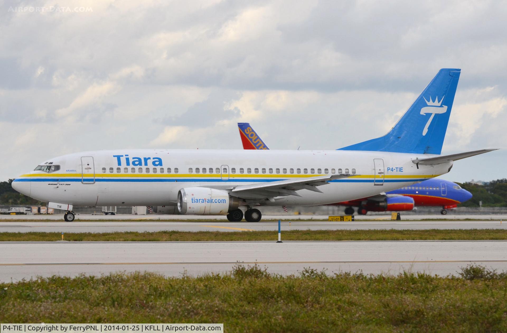 P4-TIE, 1988 Boeing 737-322 C/N 24249, Tiara B733 taxying for departure
