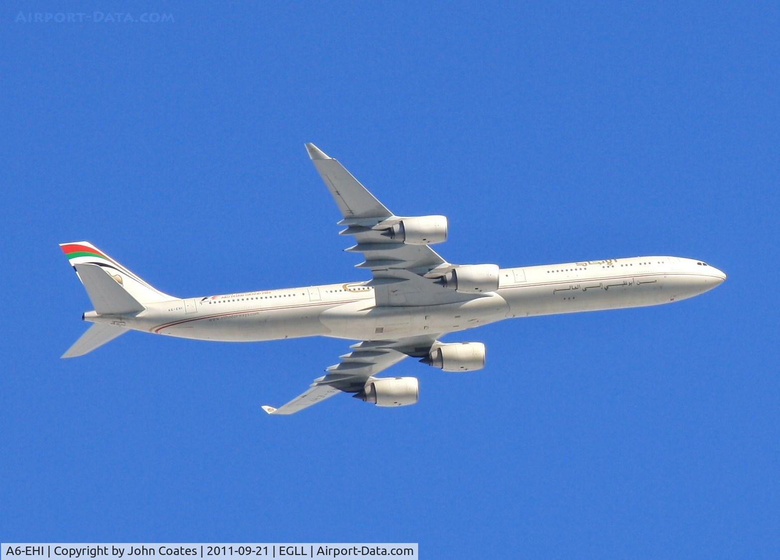 A6-EHI, 2008 Airbus A340-642X C/N 929, Climbing out of Heathrow over Chertsey