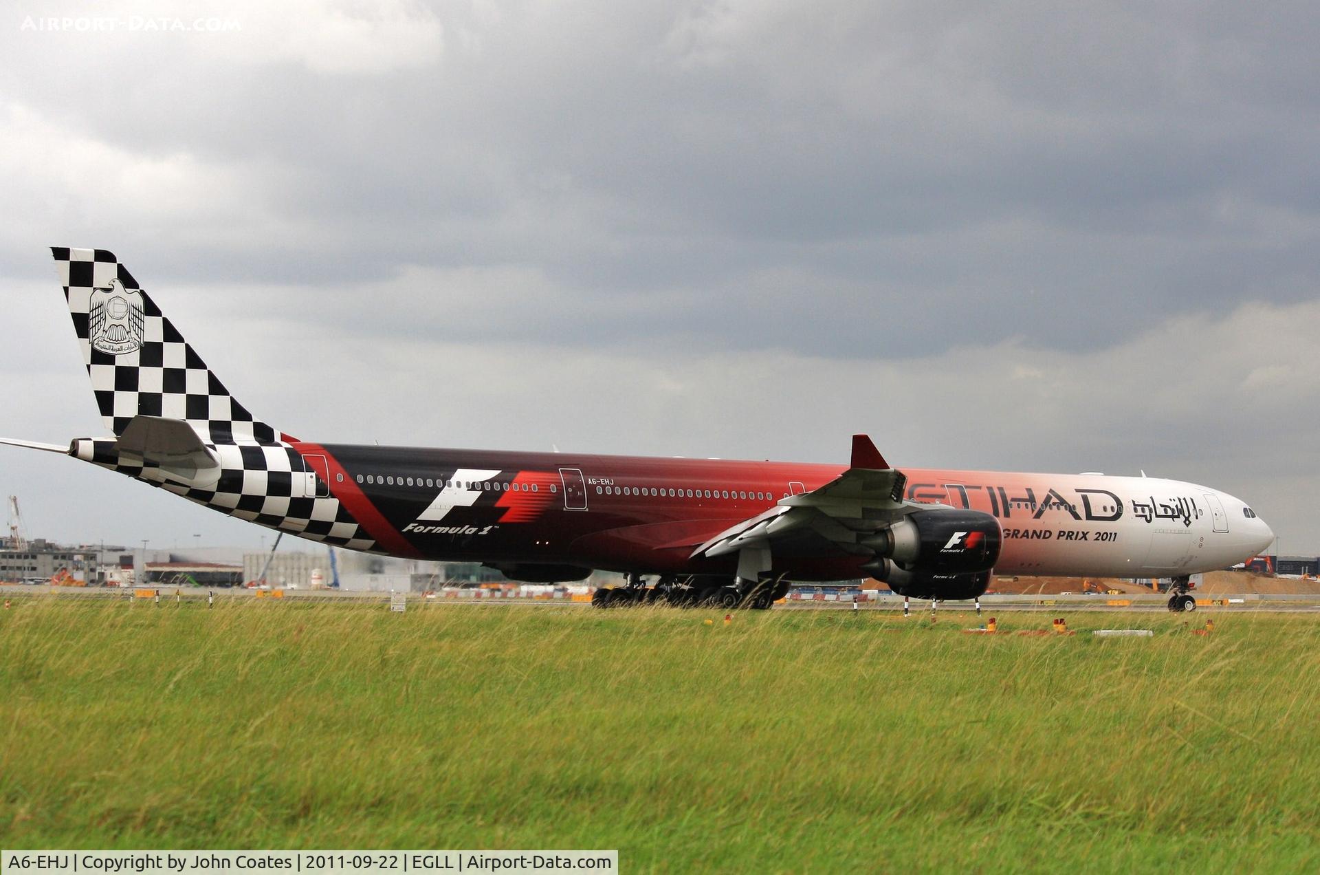 A6-EHJ, 2008 Airbus A340-642X C/N 933, Waiting at 27L