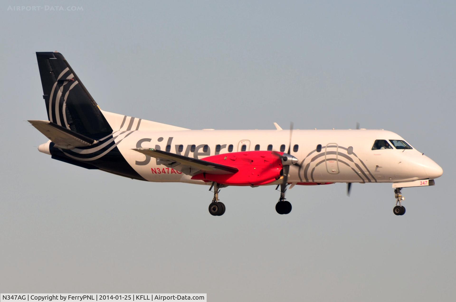 N347AG, 1998 Saab 340B C/N 340B-447, Silver SF340 landing in FLL