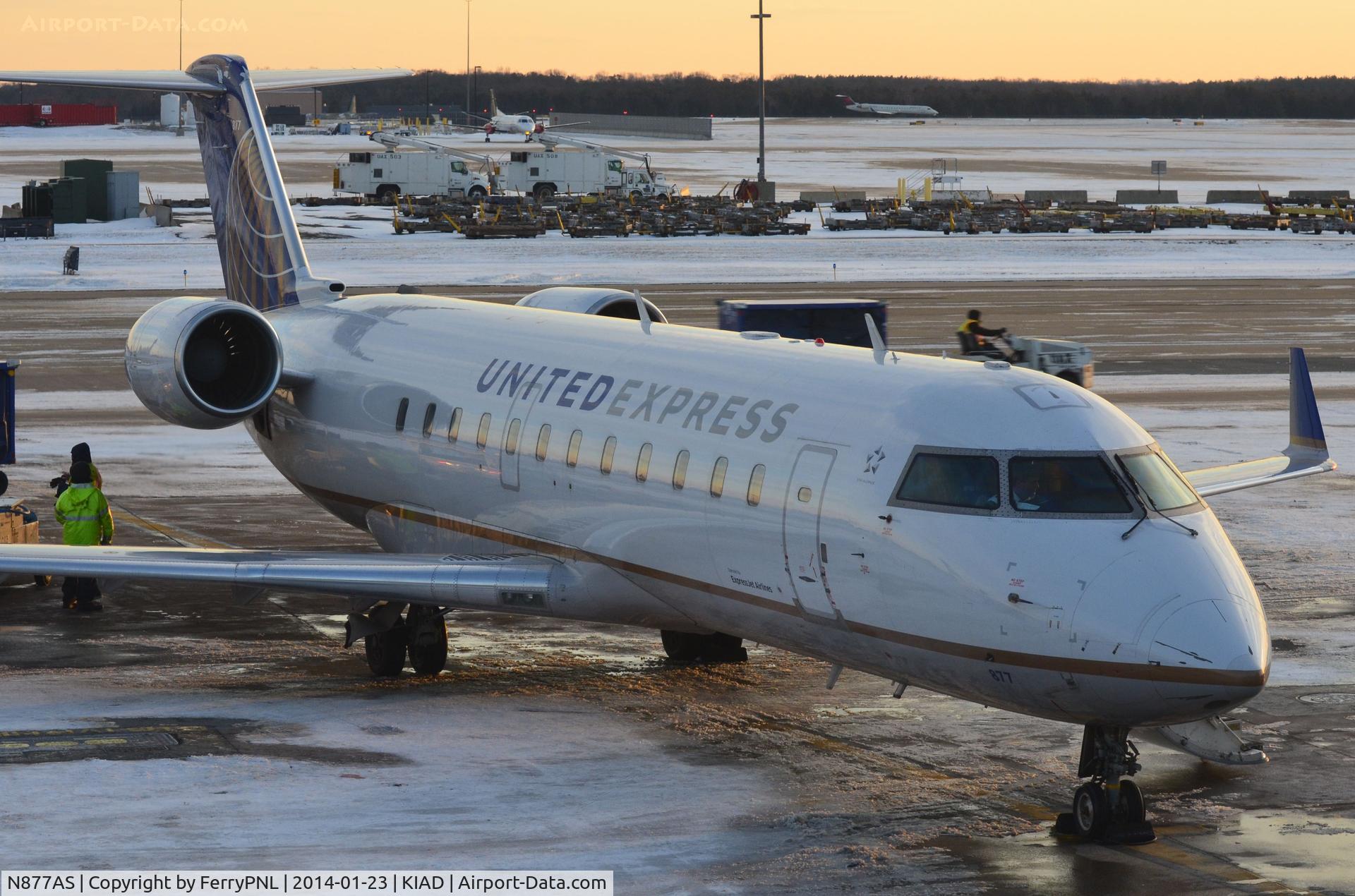 N877AS, 2001 Bombardier CRJ-200ER (CL-600-2B19) C/N 7579, United Express CL200 at its gate in IAD.
