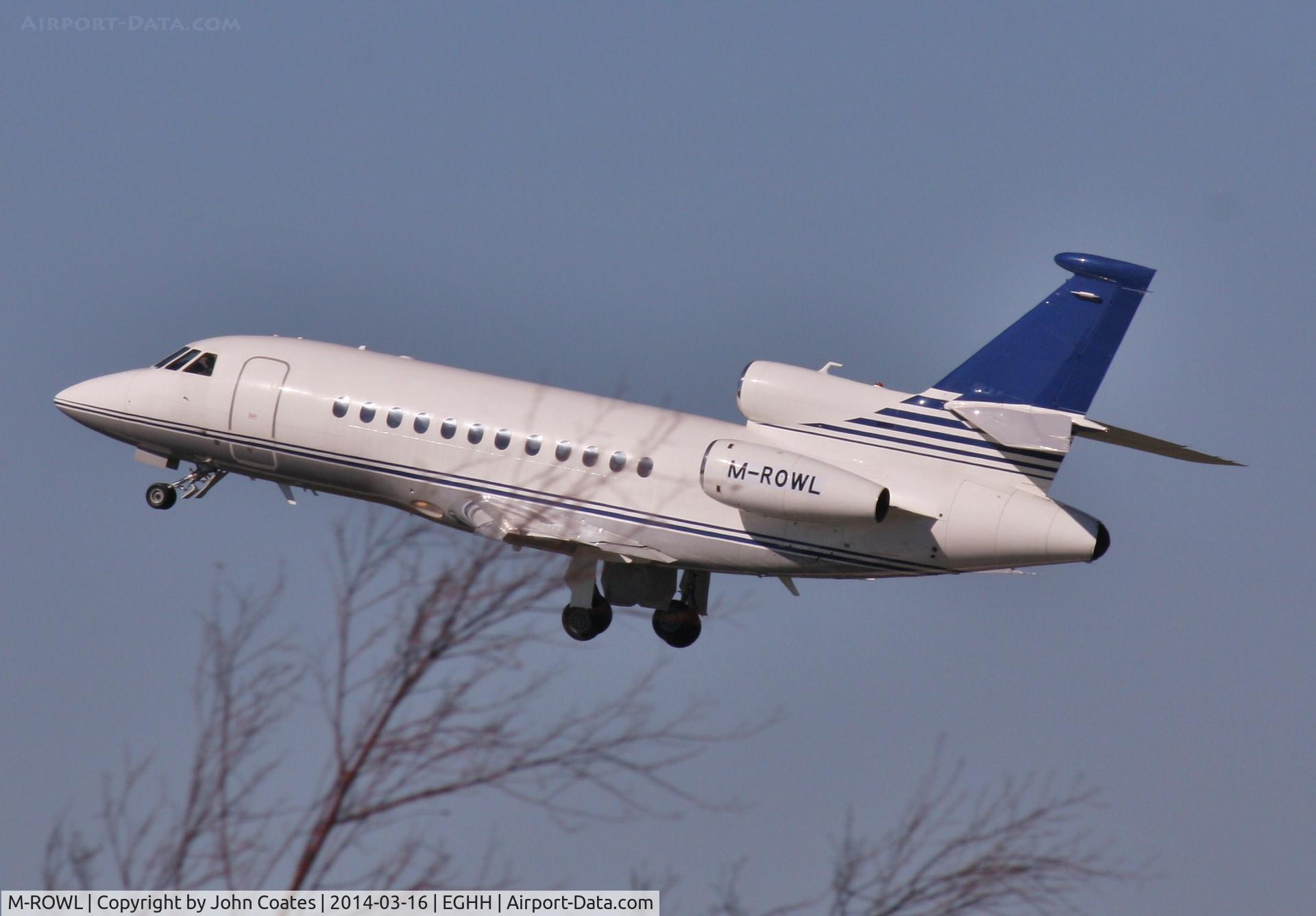 M-ROWL, 2009 Dassault Falcon 900EX C/N 217, ex LX-GET still not clear of those wonderful trees!