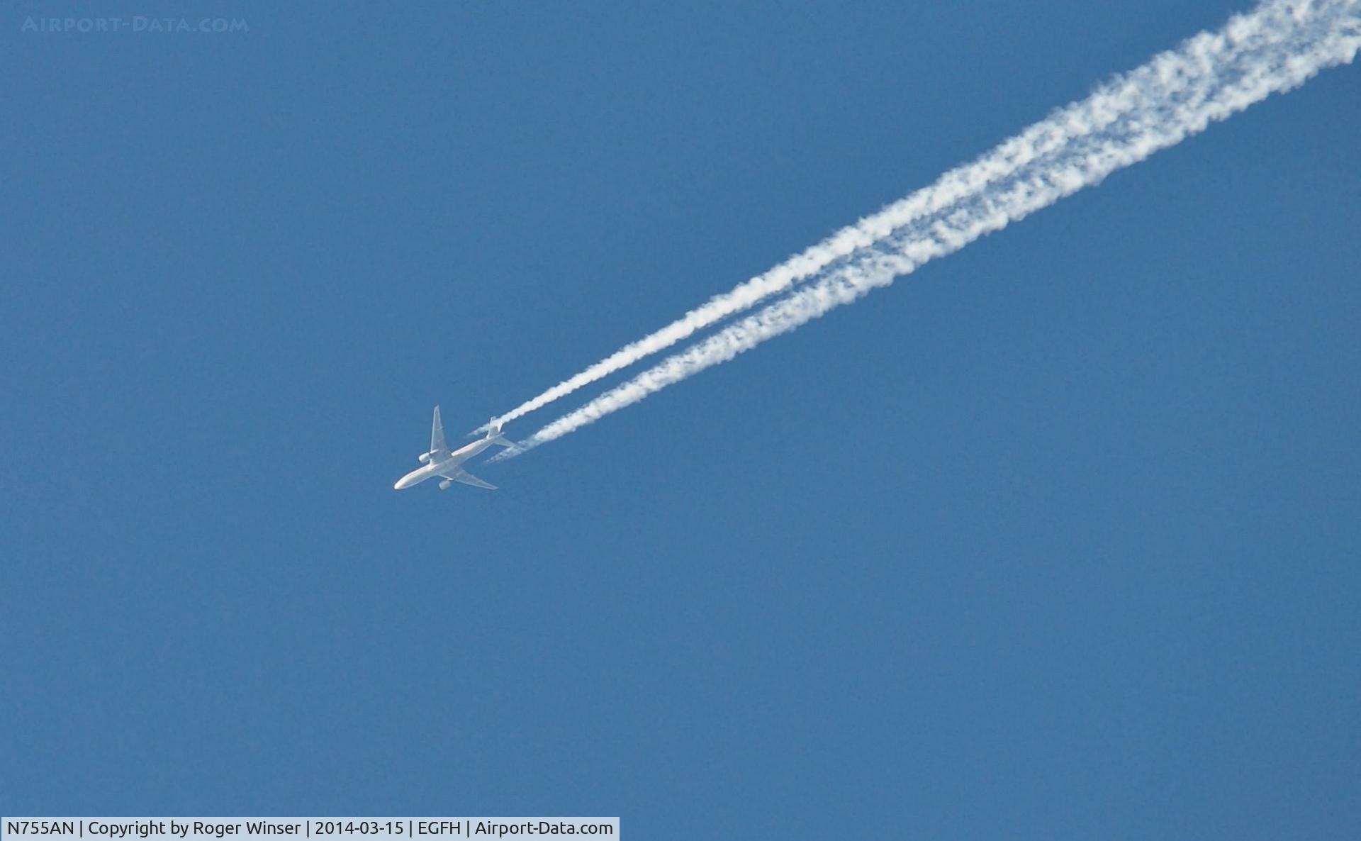 N755AN, 2001 Boeing 777-223 C/N 30263, B772 of American Airlines flying west over Swansea Airport at 38000 feet.