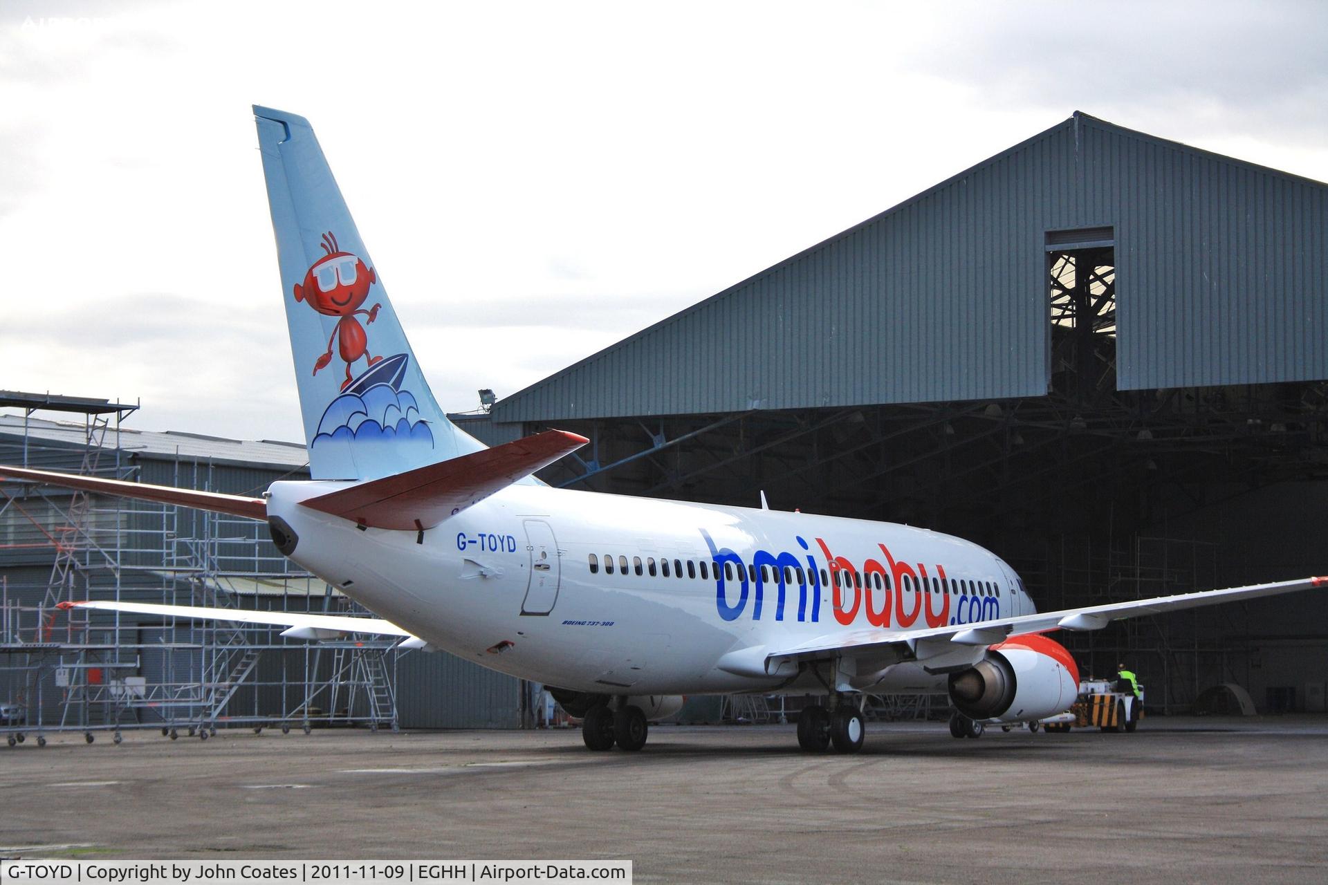G-TOYD, 1994 Boeing 737-3Q8 C/N 26307, Exits paintshop after repaint