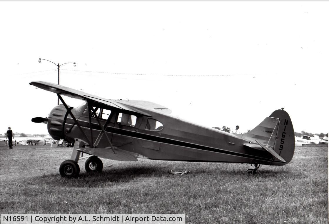 N16591, 1936 Waco EQC-6 C/N 4490, This photo, taken by my dad, A.L. Schmidt, is undated. Estimated 1985. Unknown airport/field - perhaps at EAA.