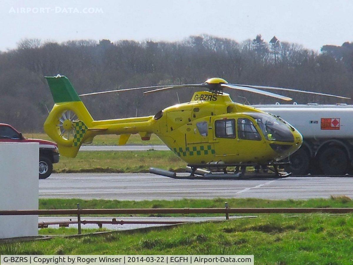 G-BZRS, 2000 Eurocopter EC-135T-2 C/N 0166, Former Hampshire and Isle of Wight Air Ambulance helicopter taking on fuel.
